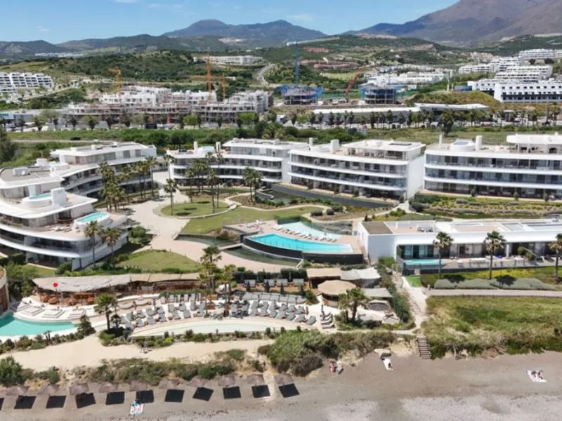 Welcome to this luxurious apartment located in the exclusive beachfront residential complex The Edge. This 2nd floor home offers four bedrooms and two bathrooms with exclusive Dornbracht finishes. The open concept living room and kitchen create a social a