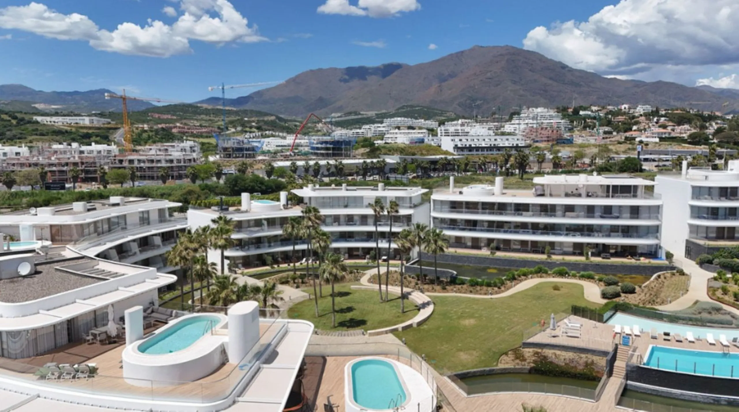 Welcome to this luxurious apartment located in the exclusive beachfront residential complex The Edge. This 2nd floor home offers four bedrooms and two bathrooms with exclusive Dornbracht finishes. The open concept living room and kitchen create a social a