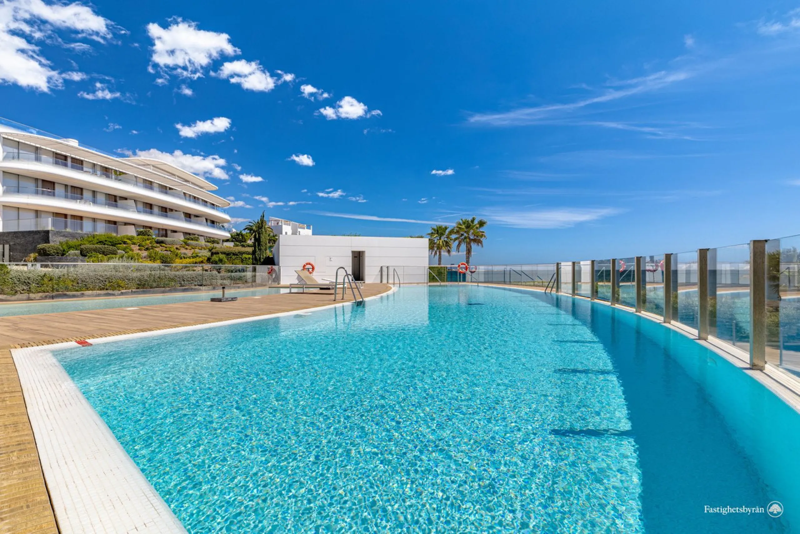 Welcome to this luxurious apartment located in the exclusive beachfront residential complex The Edge. This 2nd floor home offers four bedrooms and two bathrooms with exclusive Dornbracht finishes. The open concept living room and kitchen create a social a