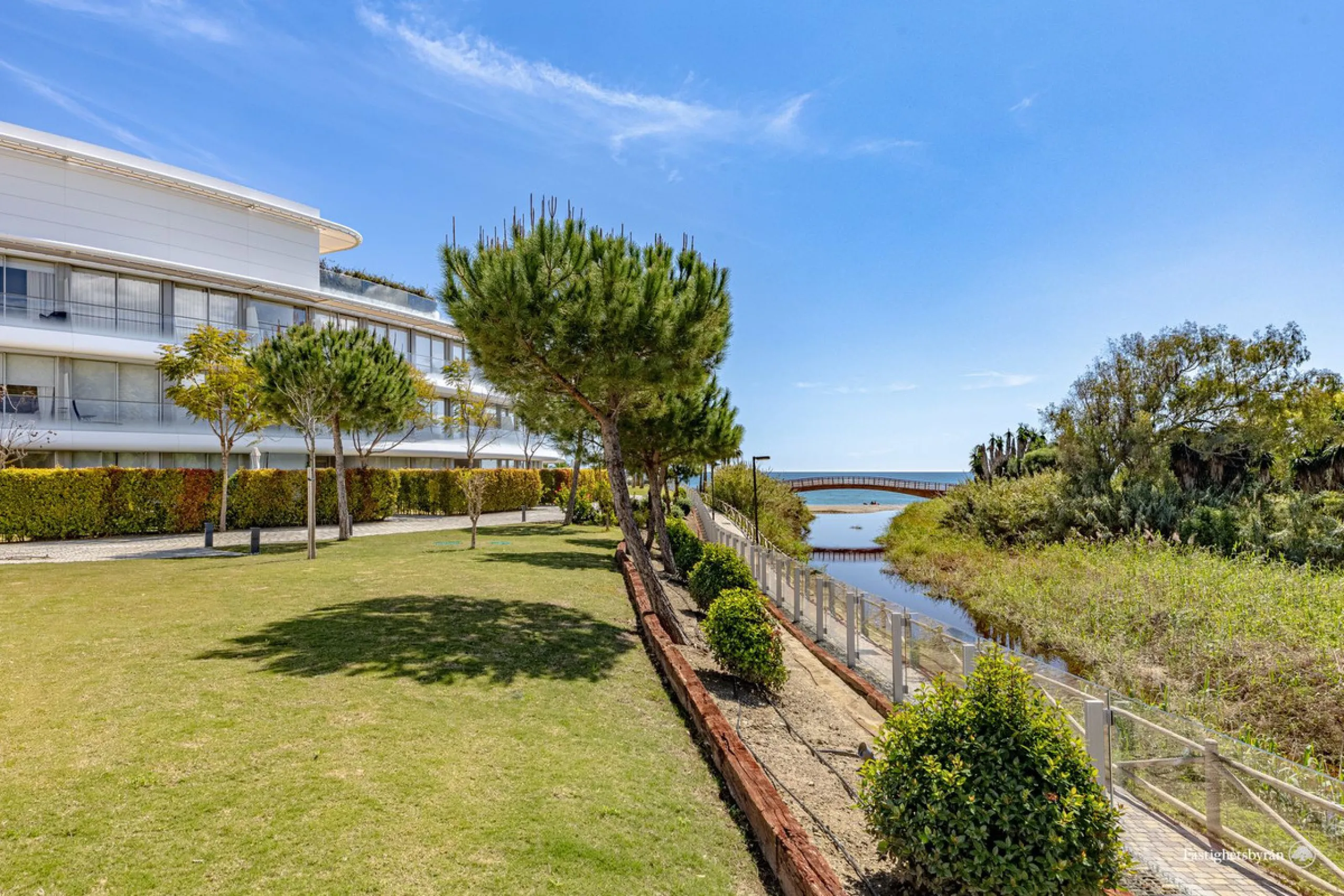 Welcome to this luxurious apartment located in the exclusive beachfront residential complex The Edge. This 2nd floor home offers four bedrooms and two bathrooms with exclusive Dornbracht finishes. The open concept living room and kitchen create a social a