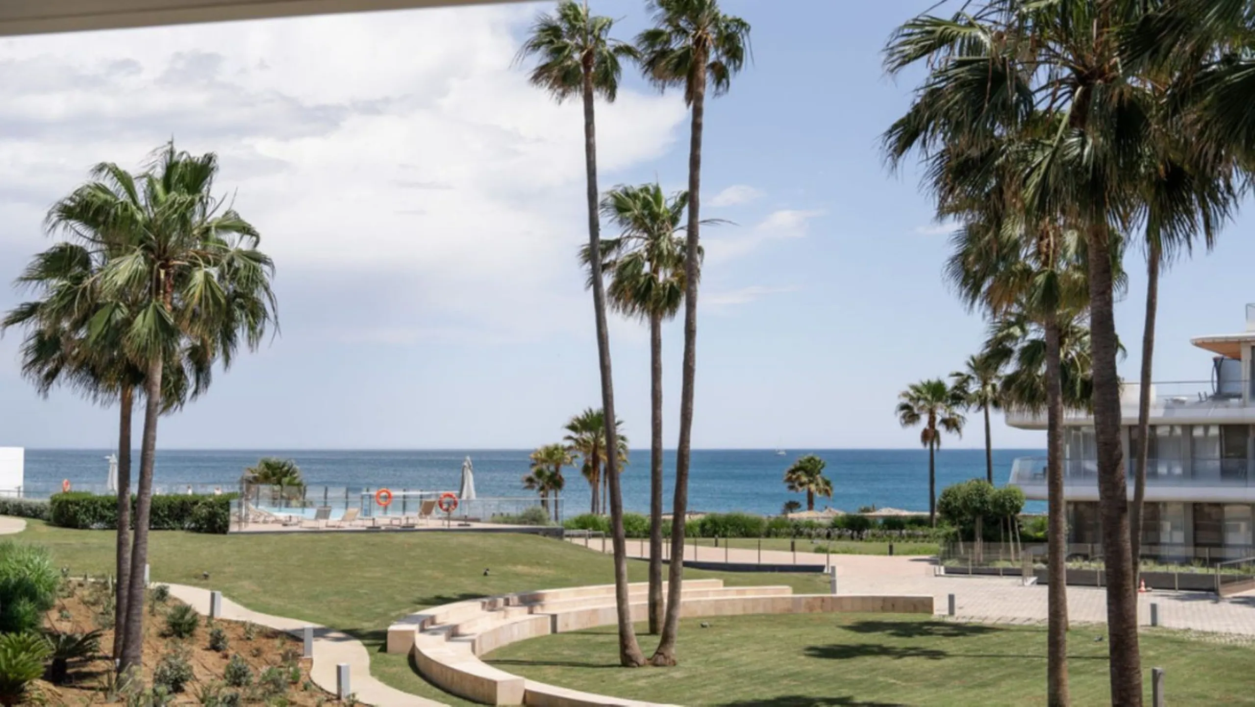 Welcome to this luxurious apartment located in the exclusive beachfront residential complex The Edge. This 2nd floor home offers four bedrooms and two bathrooms with exclusive Dornbracht finishes. The open concept living room and kitchen create a social a