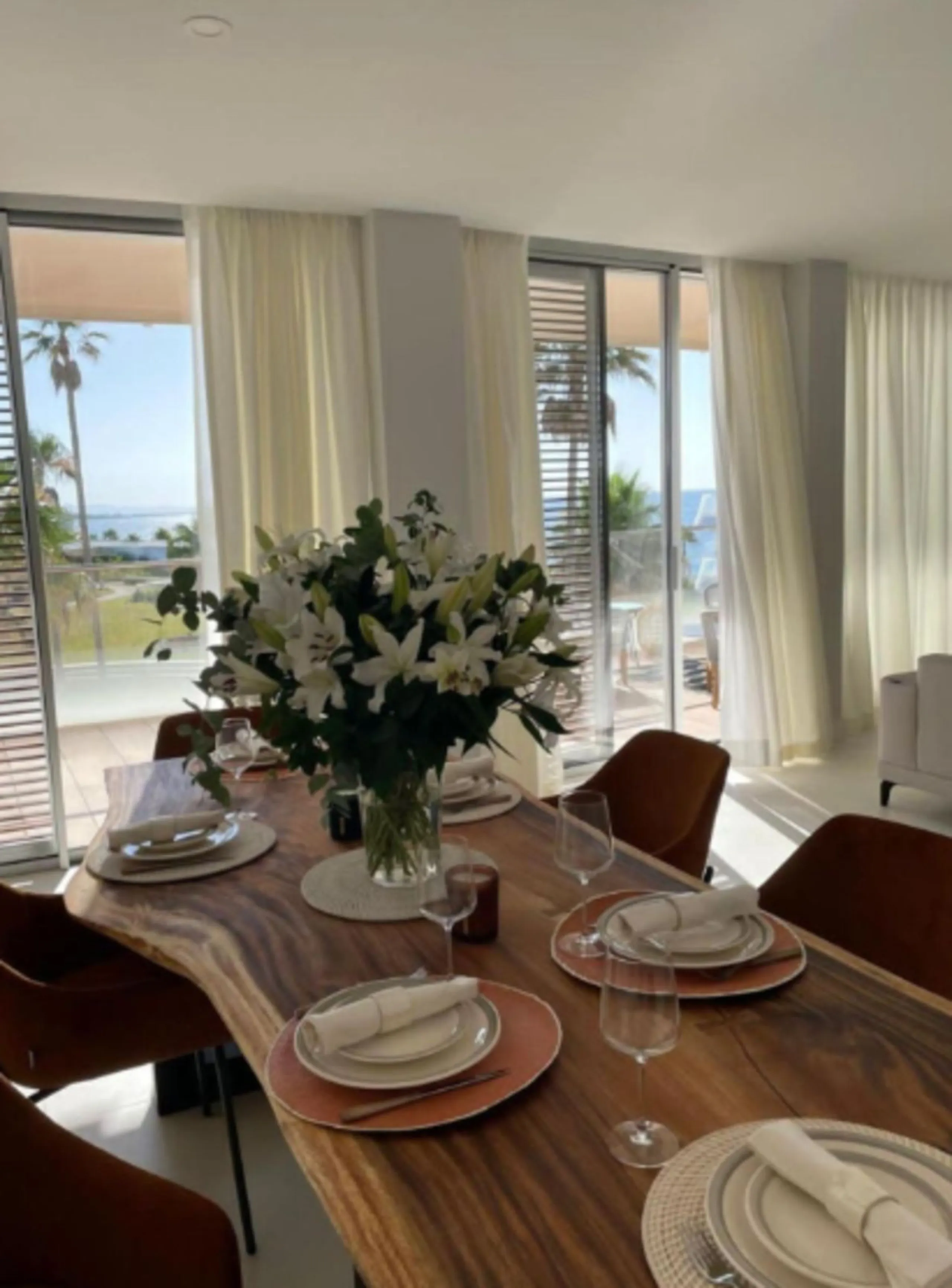 Welcome to this luxurious apartment located in the exclusive beachfront residential complex The Edge. This 2nd floor home offers four bedrooms and two bathrooms with exclusive Dornbracht finishes. The open concept living room and kitchen create a social a