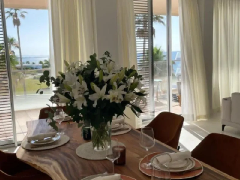 Welcome to this luxurious apartment located in the exclusive beachfront residential complex The Edge. This 2nd floor home offers four bedrooms and two bathrooms with exclusive Dornbracht finishes. The open concept living room and kitchen create a social a