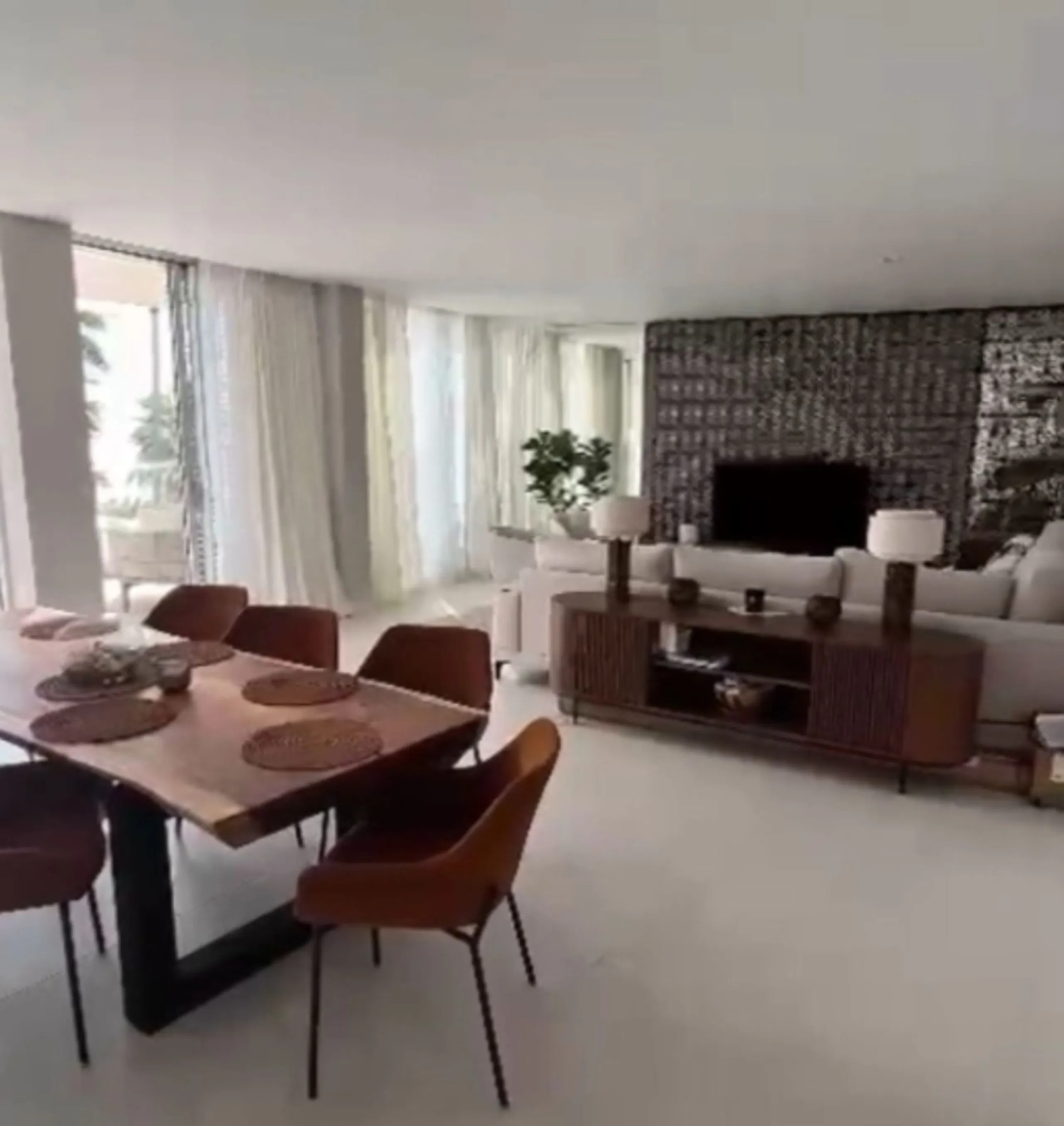 Welcome to this luxurious apartment located in the exclusive beachfront residential complex The Edge. This 2nd floor home offers four bedrooms and two bathrooms with exclusive Dornbracht finishes. The open concept living room and kitchen create a social a