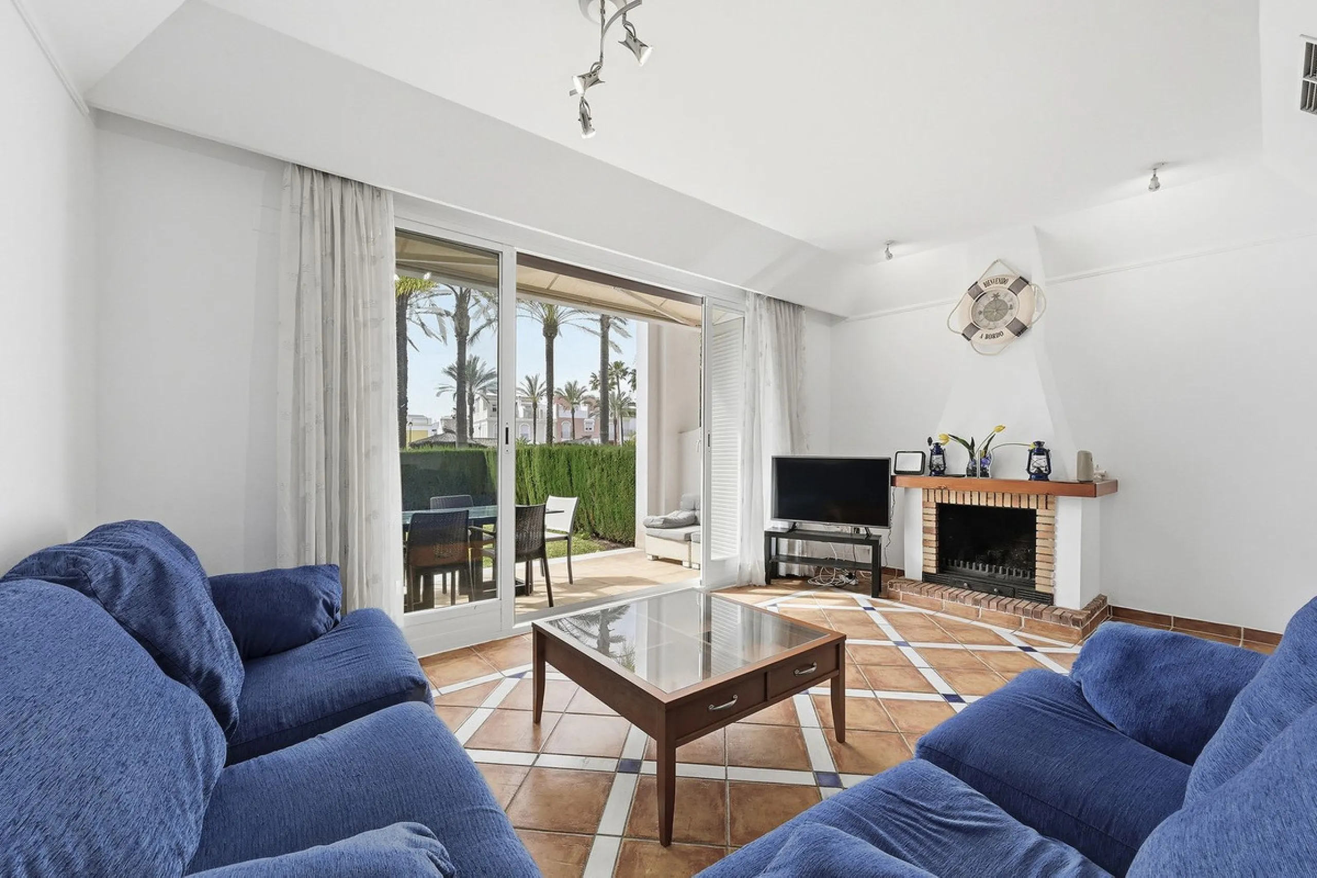 Nestled within one of Bahía de Marbella's most sought-after beachfront urbanizations, this stunning townhouse offers an unparalleled coastal living experience. Imagine waking up to the sound of the waves and having direct, private access to the golden san