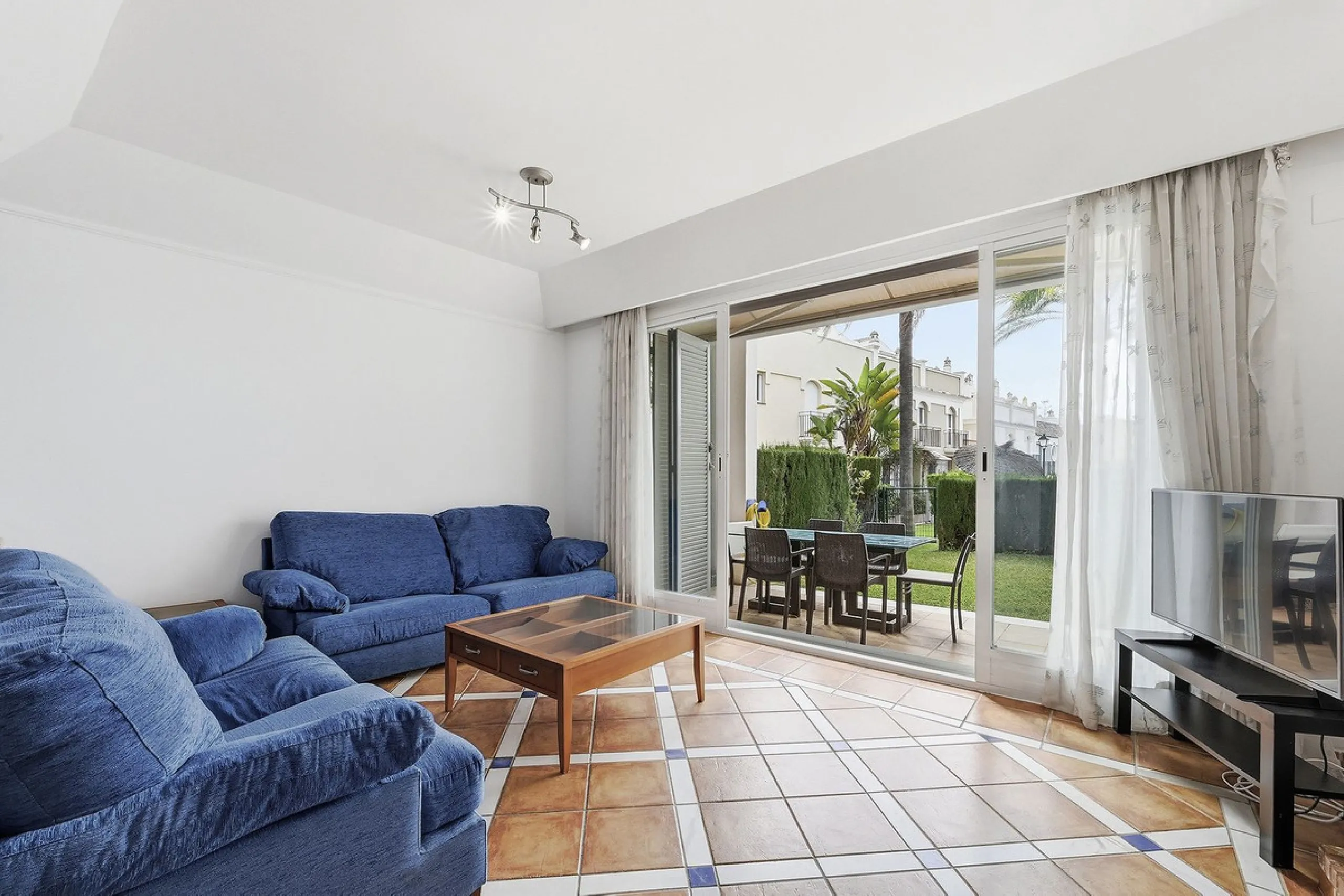 Nestled within one of Bahía de Marbella's most sought-after beachfront urbanizations, this stunning townhouse offers an unparalleled coastal living experience. Imagine waking up to the sound of the waves and having direct, private access to the golden san