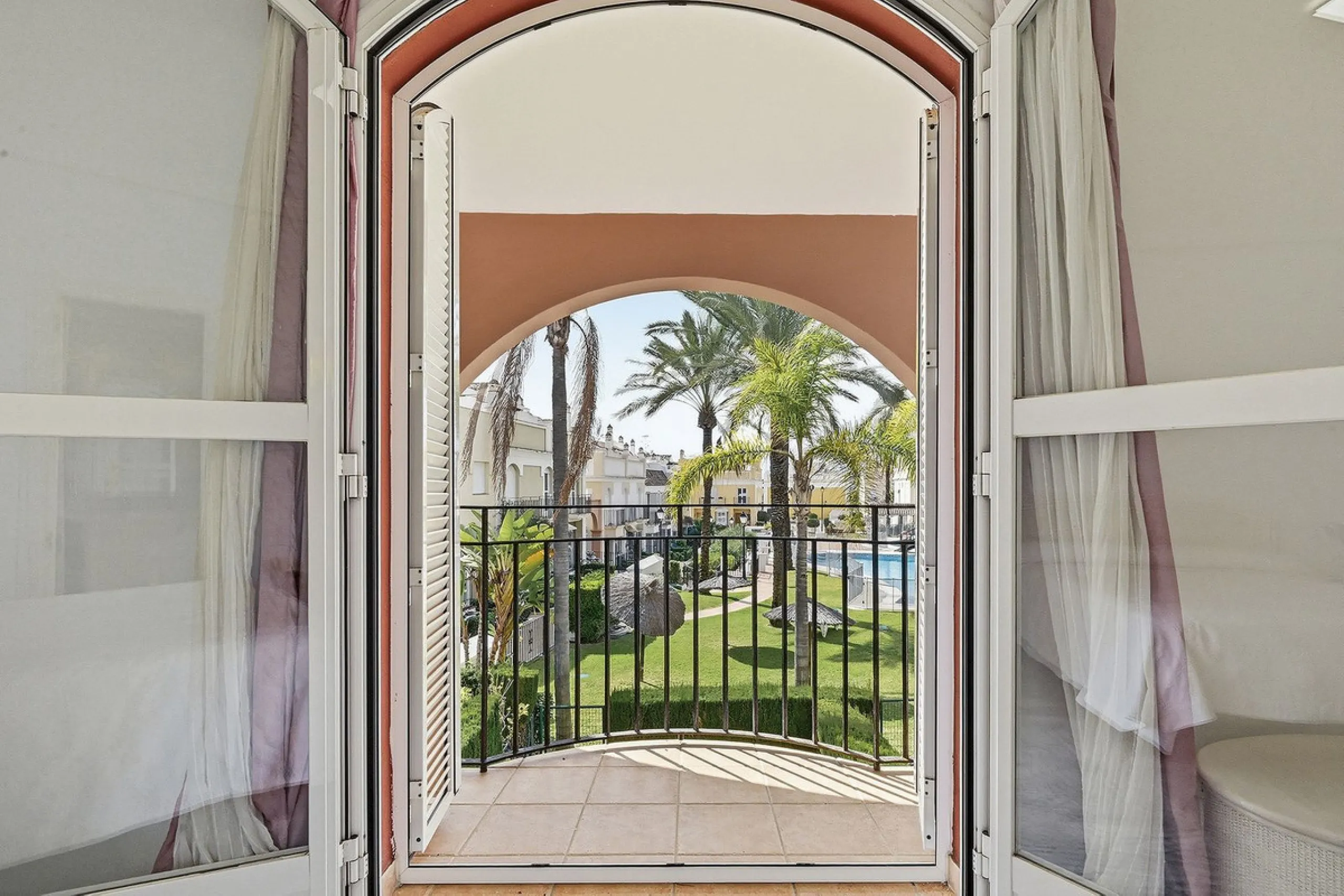 Nestled within one of Bahía de Marbella's most sought-after beachfront urbanizations, this stunning townhouse offers an unparalleled coastal living experience. Imagine waking up to the sound of the waves and having direct, private access to the golden san