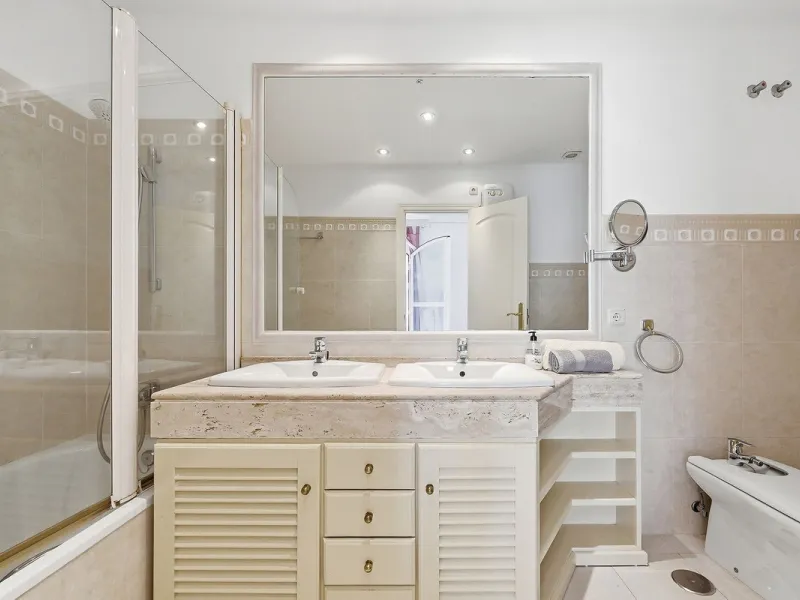 Nestled within one of Bahía de Marbella's most sought-after beachfront urbanizations, this stunning townhouse offers an unparalleled coastal living experience. Imagine waking up to the sound of the waves and having direct, private access to the golden san