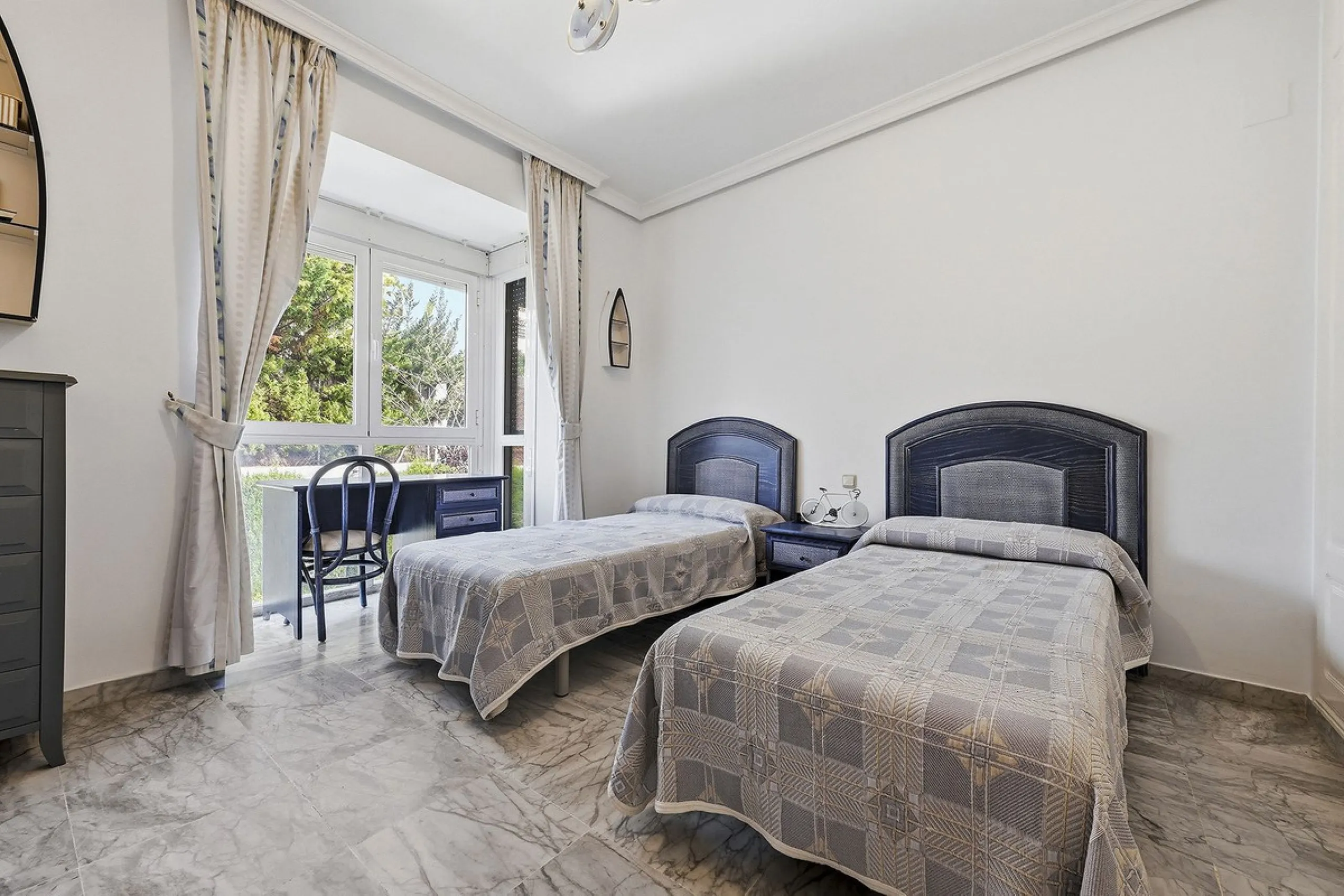 Nestled within one of Bahía de Marbella's most sought-after beachfront urbanizations, this stunning townhouse offers an unparalleled coastal living experience. Imagine waking up to the sound of the waves and having direct, private access to the golden san