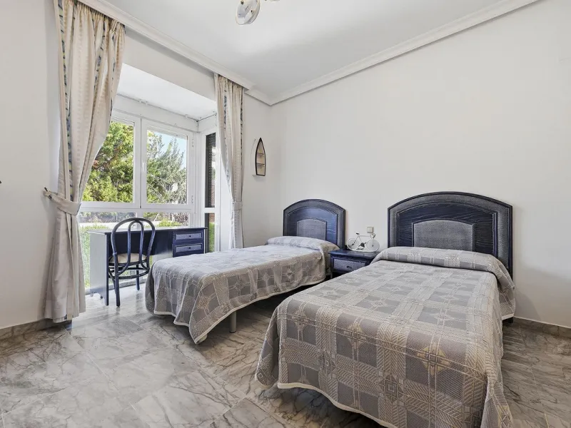 Nestled within one of Bahía de Marbella's most sought-after beachfront urbanizations, this stunning townhouse offers an unparalleled coastal living experience. Imagine waking up to the sound of the waves and having direct, private access to the golden san