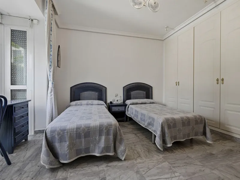 Nestled within one of Bahía de Marbella's most sought-after beachfront urbanizations, this stunning townhouse offers an unparalleled coastal living experience. Imagine waking up to the sound of the waves and having direct, private access to the golden san