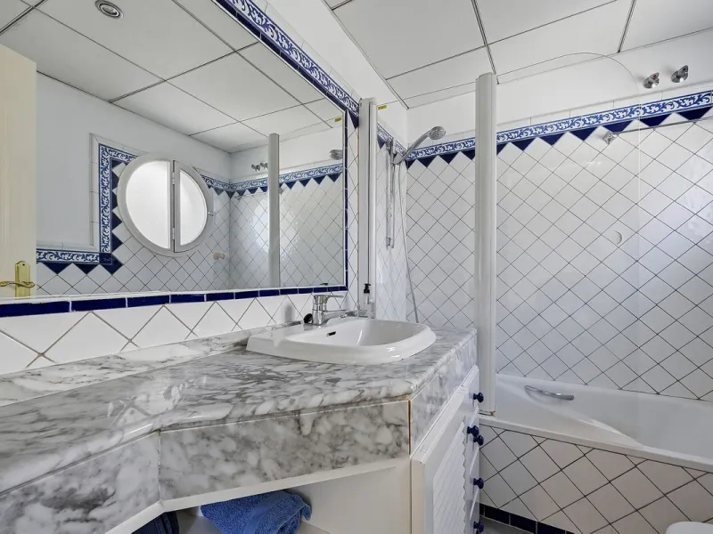 Nestled within one of Bahía de Marbella's most sought-after beachfront urbanizations, this stunning townhouse offers an unparalleled coastal living experience. Imagine waking up to the sound of the waves and having direct, private access to the golden san