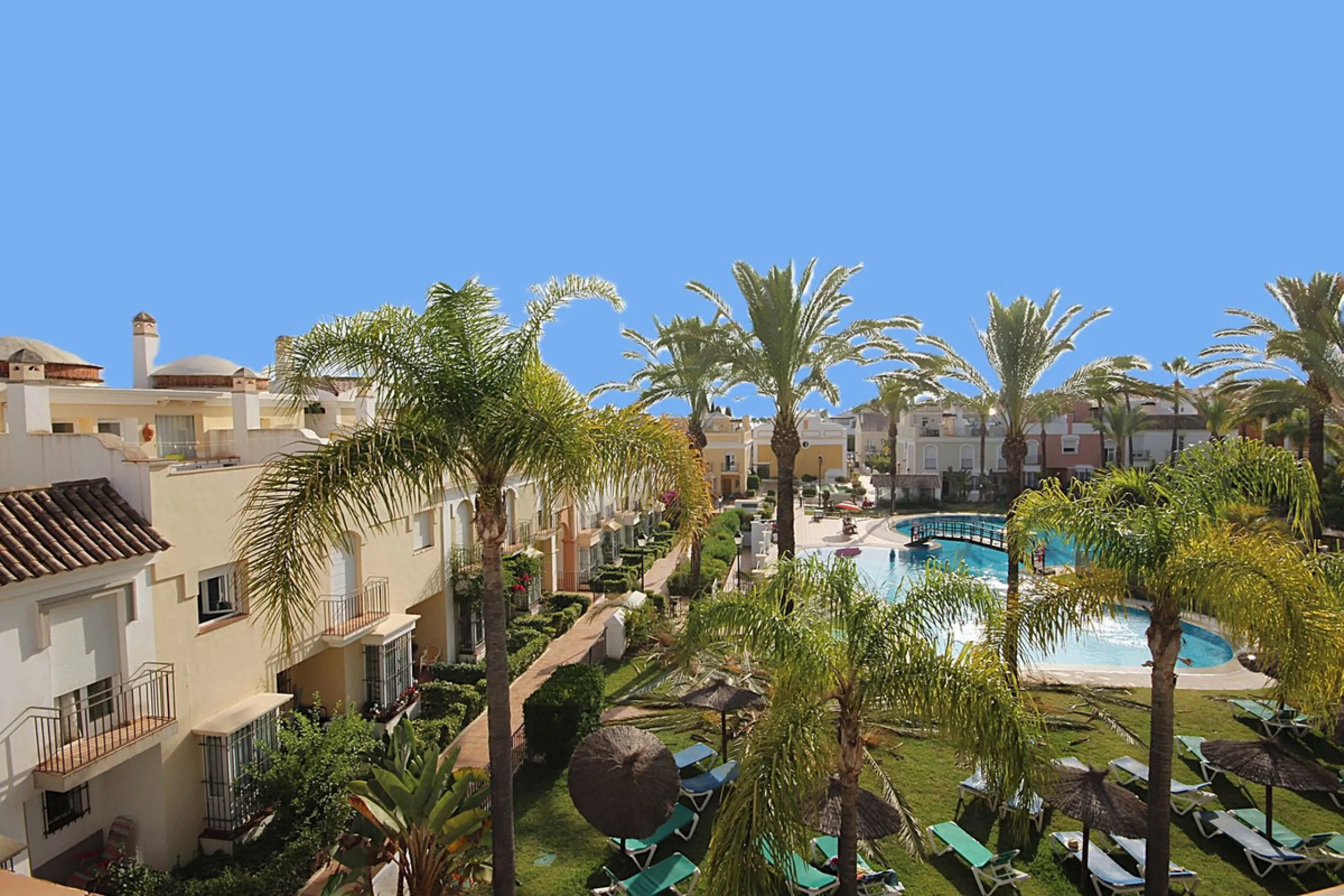 Nestled within one of Bahía de Marbella's most sought-after beachfront urbanizations, this stunning townhouse offers an unparalleled coastal living experience. Imagine waking up to the sound of the waves and having direct, private access to the golden san