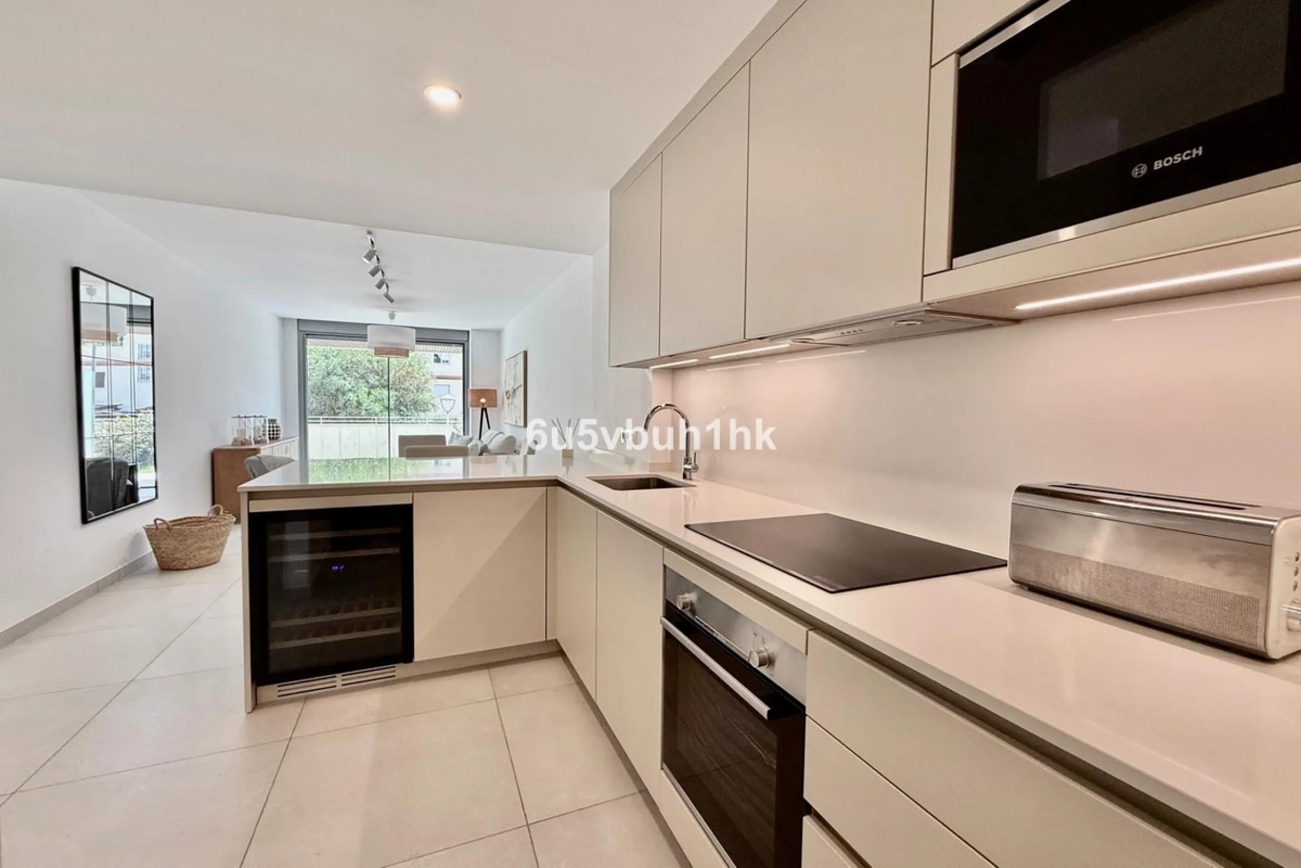 Welcome to your new home just 300 metres from one of Marbella's finest beaches, where modern comfort meets relaxed coastal living. This beautiful ground-floor apartment is located in an elegant and contemporary residential community designed to offer conv