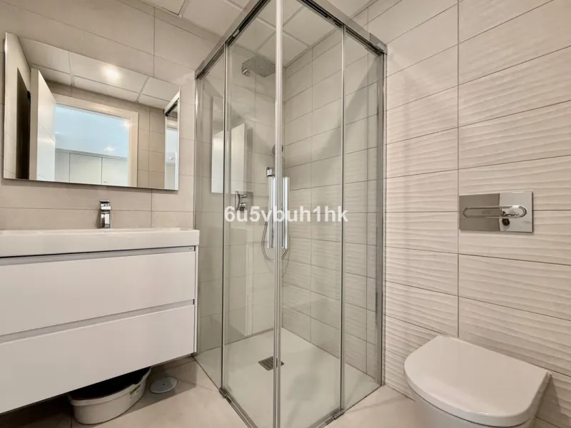 Welcome to your new home just 300 metres from one of Marbella's finest beaches, where modern comfort meets relaxed coastal living. This beautiful ground-floor apartment is located in an elegant and contemporary residential community designed to offer conv