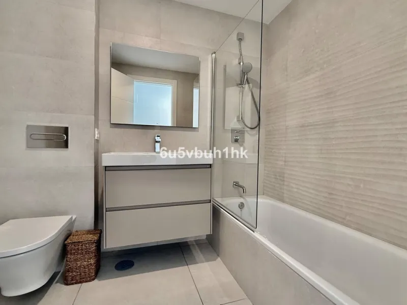 Welcome to your new home just 300 metres from one of Marbella's finest beaches, where modern comfort meets relaxed coastal living. This beautiful ground-floor apartment is located in an elegant and contemporary residential community designed to offer conv