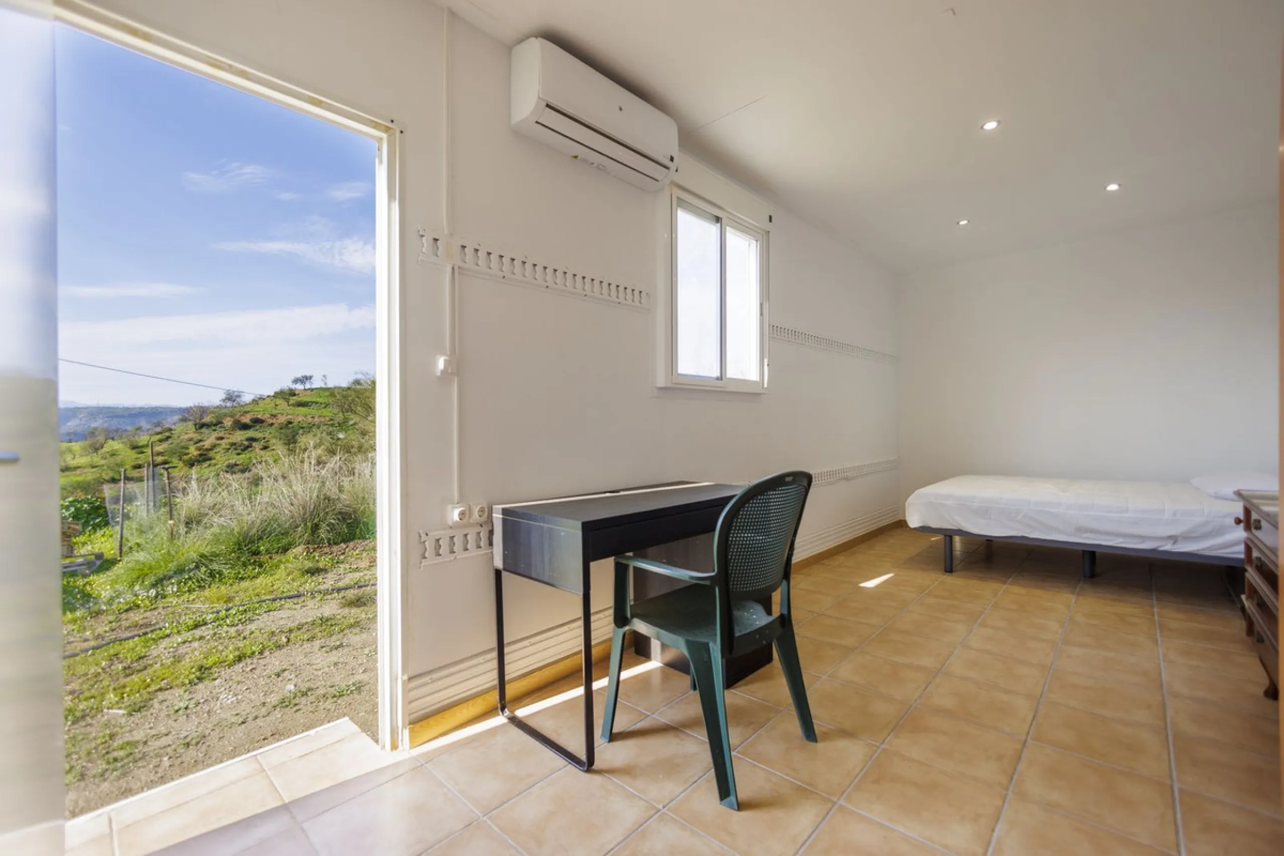 For sale: a characterful and authentic Spanish finca just 15 minutes from the lively village of Pizarra, right in the heart of Andalusia. This unique property boasts an impressive 63,766 m² of private land and features two fully independent homes — ideal 