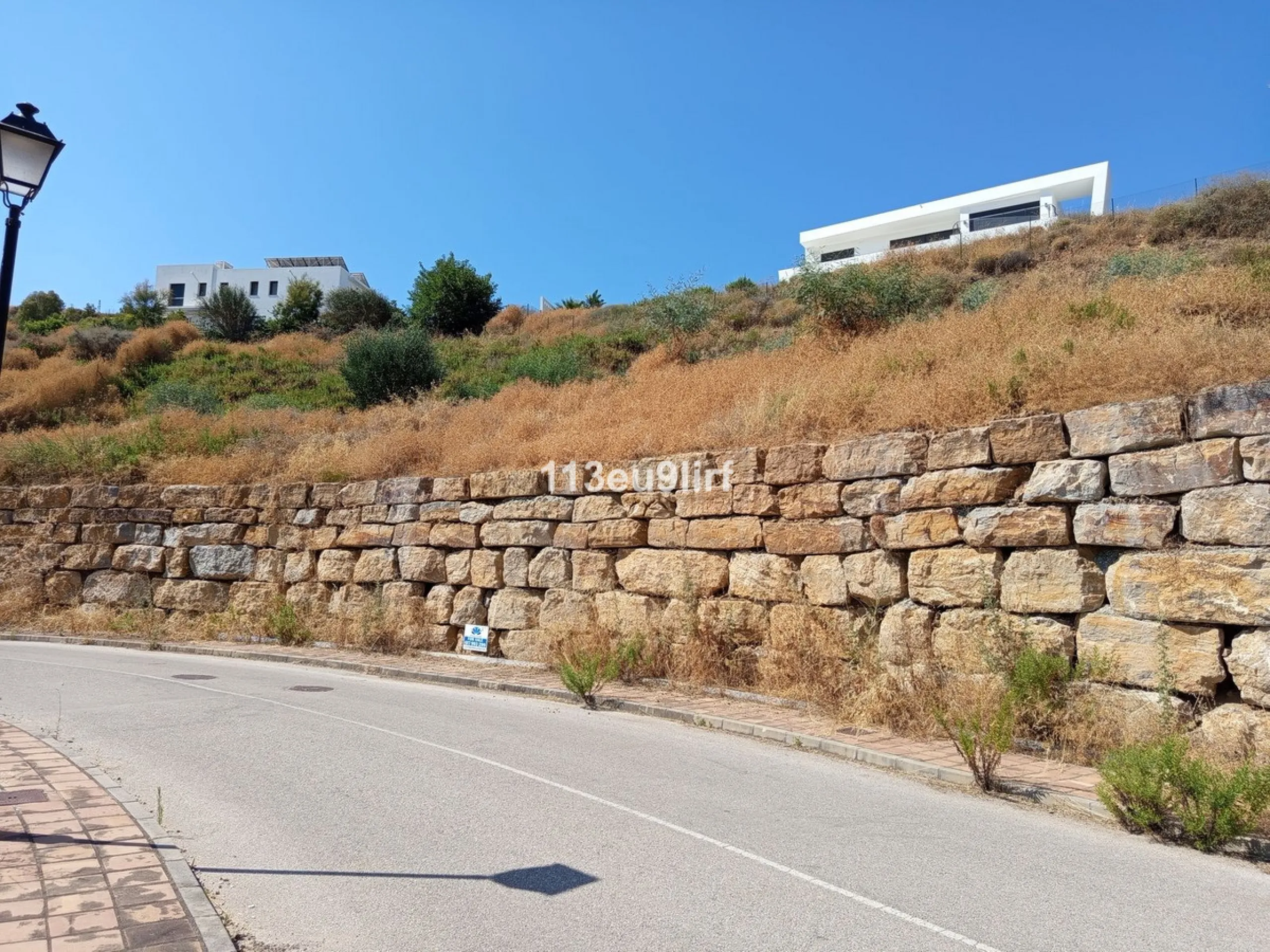 Residential plot with retaining wall and preliminary project. This plot offers panoramic sea, mountain and golf views and is located within La Cala Golf Resort with three 18 hole championship golf courses, Clubhouse, Hotel and Spa, 24 hour onsite security