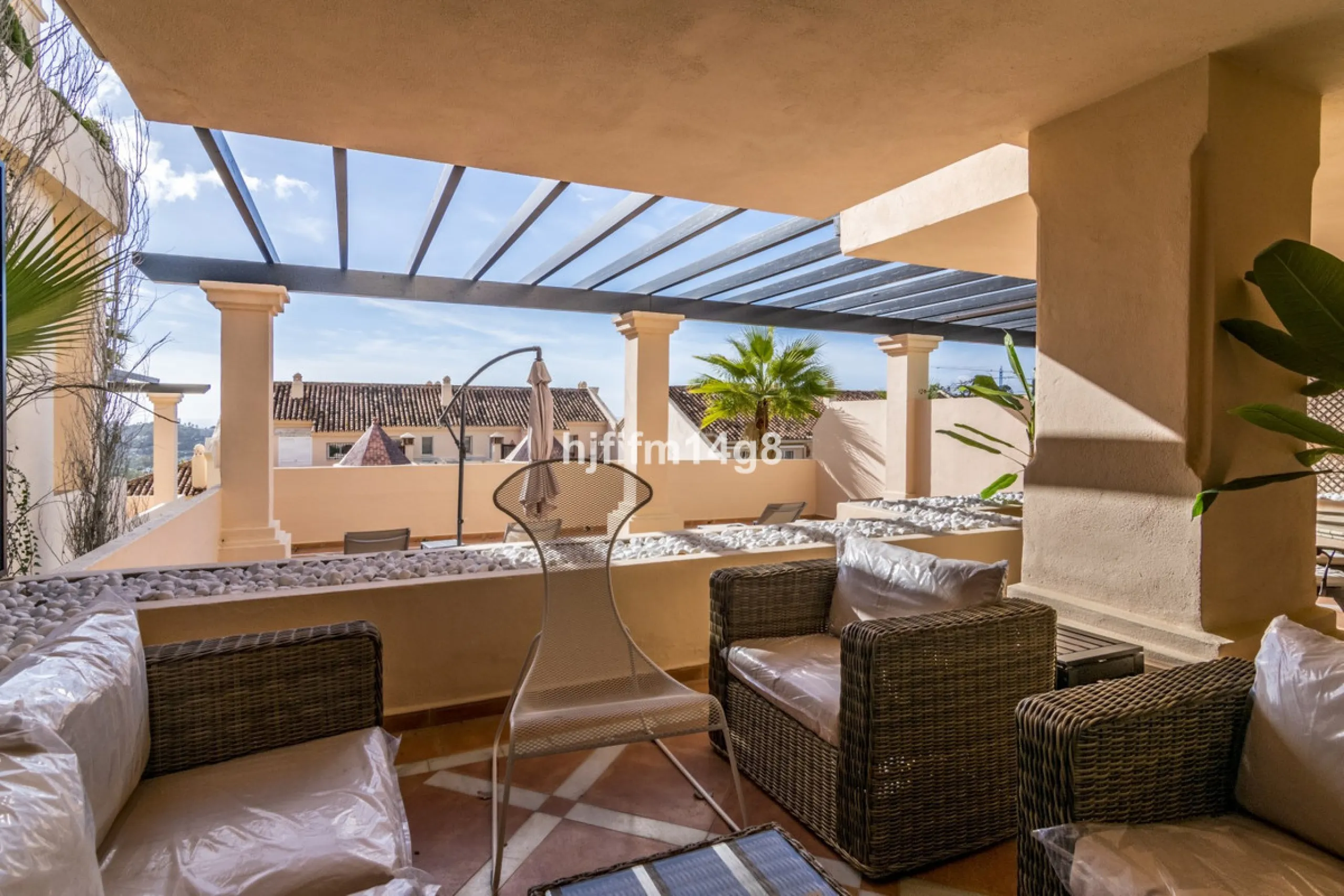 Discover this elegant two-bedroom elevated ground floor apartment for sale in the sought-after Albatross Hill complex, nestled in the scenic hills of Nueva Andalucía. This exclusive gated community offers a peaceful, secure lifestyle with outstanding amen