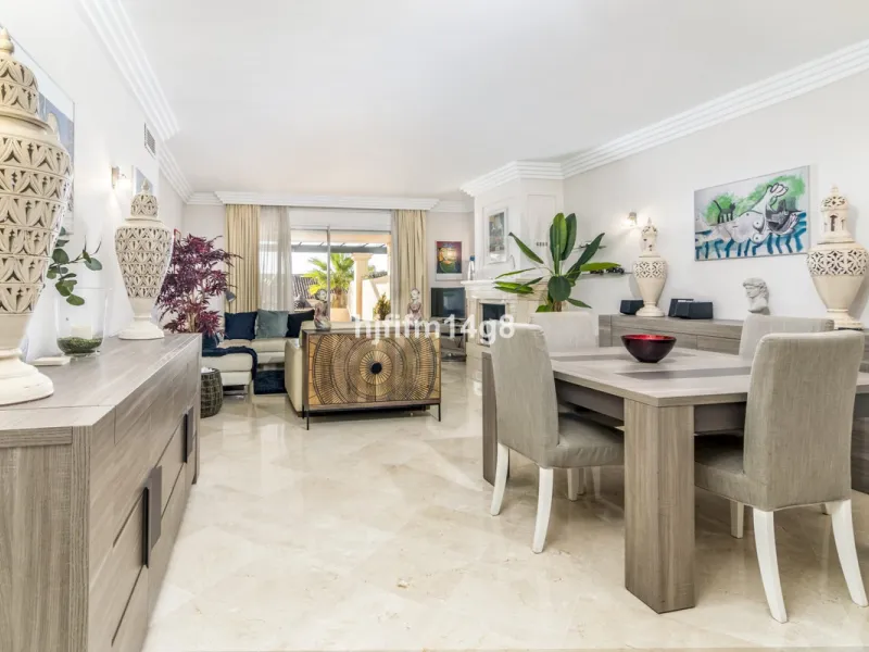 Discover this elegant two-bedroom elevated ground floor apartment for sale in the sought-after Albatross Hill complex, nestled in the scenic hills of Nueva Andalucía. This exclusive gated community offers a peaceful, secure lifestyle with outstanding amen