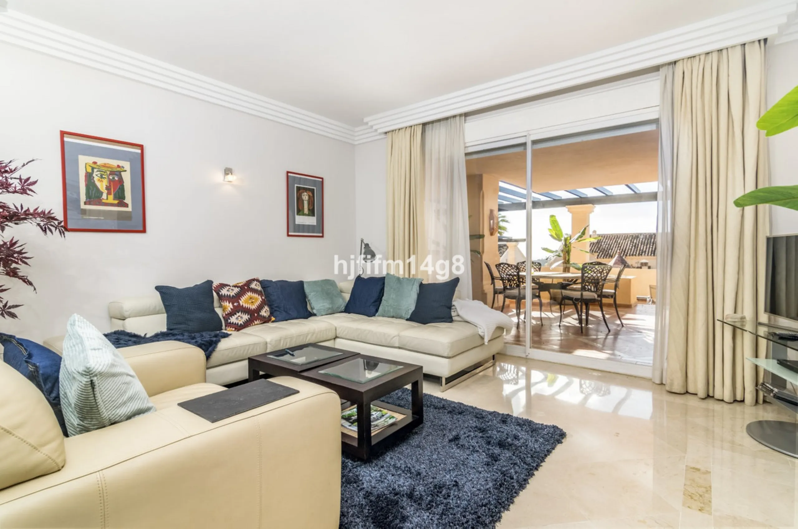 Discover this elegant two-bedroom elevated ground floor apartment for sale in the sought-after Albatross Hill complex, nestled in the scenic hills of Nueva Andalucía. This exclusive gated community offers a peaceful, secure lifestyle with outstanding amen