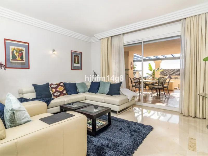 Discover this elegant two-bedroom elevated ground floor apartment for sale in the sought-after Albatross Hill complex, nestled in the scenic hills of Nueva Andalucía. This exclusive gated community offers a peaceful, secure lifestyle with outstanding amen