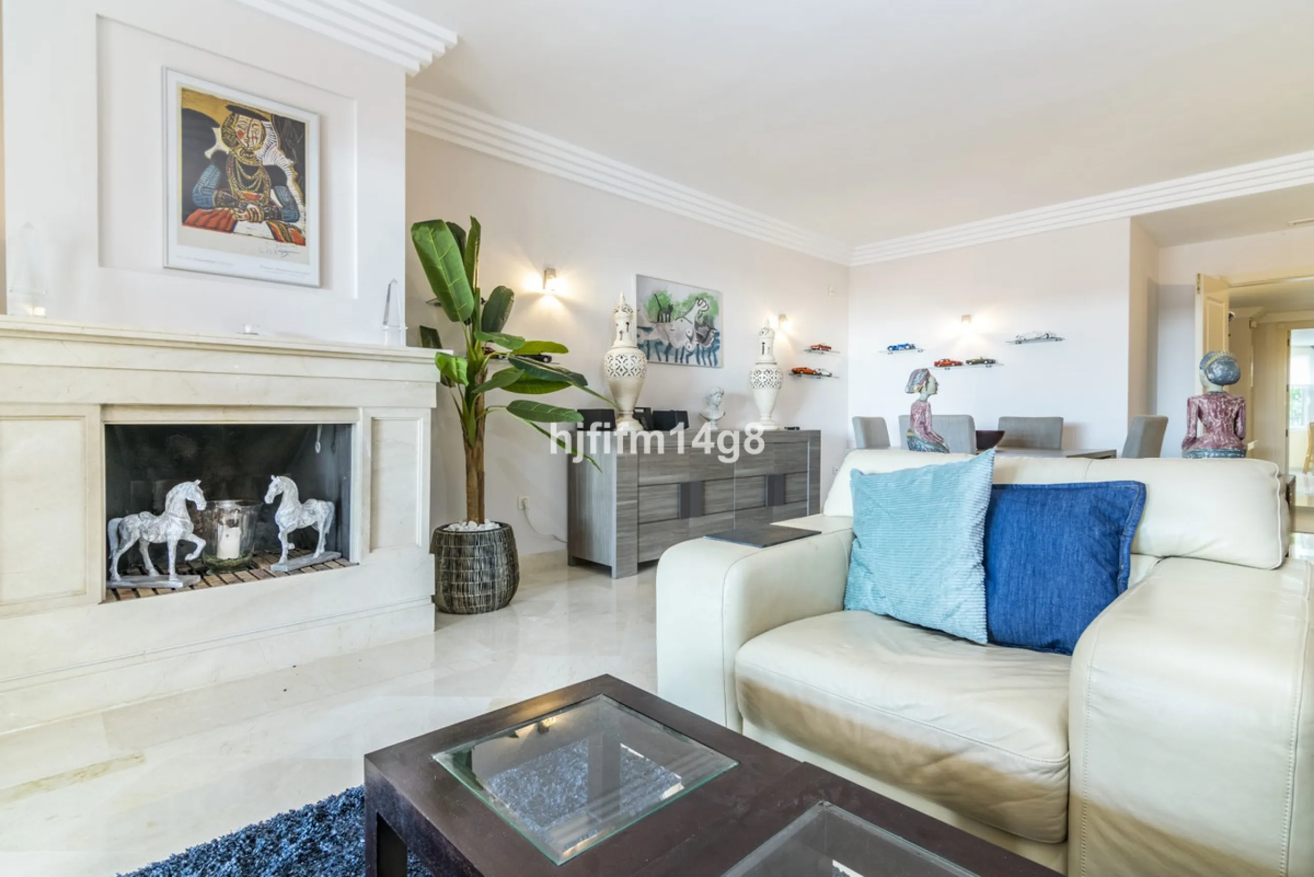 Discover this elegant two-bedroom elevated ground floor apartment for sale in the sought-after Albatross Hill complex, nestled in the scenic hills of Nueva Andalucía. This exclusive gated community offers a peaceful, secure lifestyle with outstanding amen