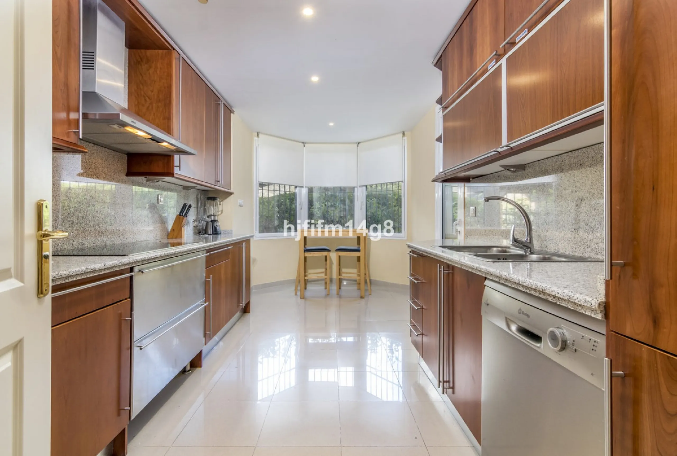 Discover this elegant two-bedroom elevated ground floor apartment for sale in the sought-after Albatross Hill complex, nestled in the scenic hills of Nueva Andalucía. This exclusive gated community offers a peaceful, secure lifestyle with outstanding amen