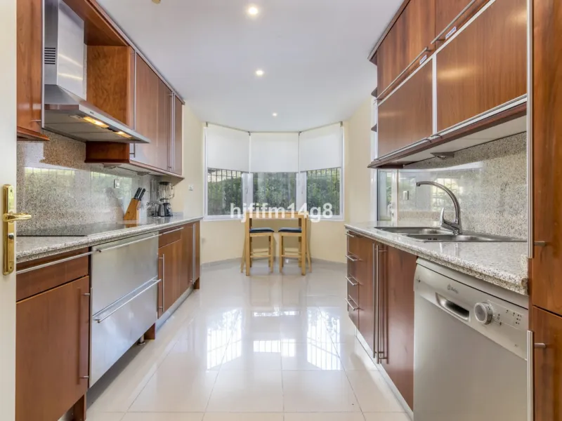 Discover this elegant two-bedroom elevated ground floor apartment for sale in the sought-after Albatross Hill complex, nestled in the scenic hills of Nueva Andalucía. This exclusive gated community offers a peaceful, secure lifestyle with outstanding amen