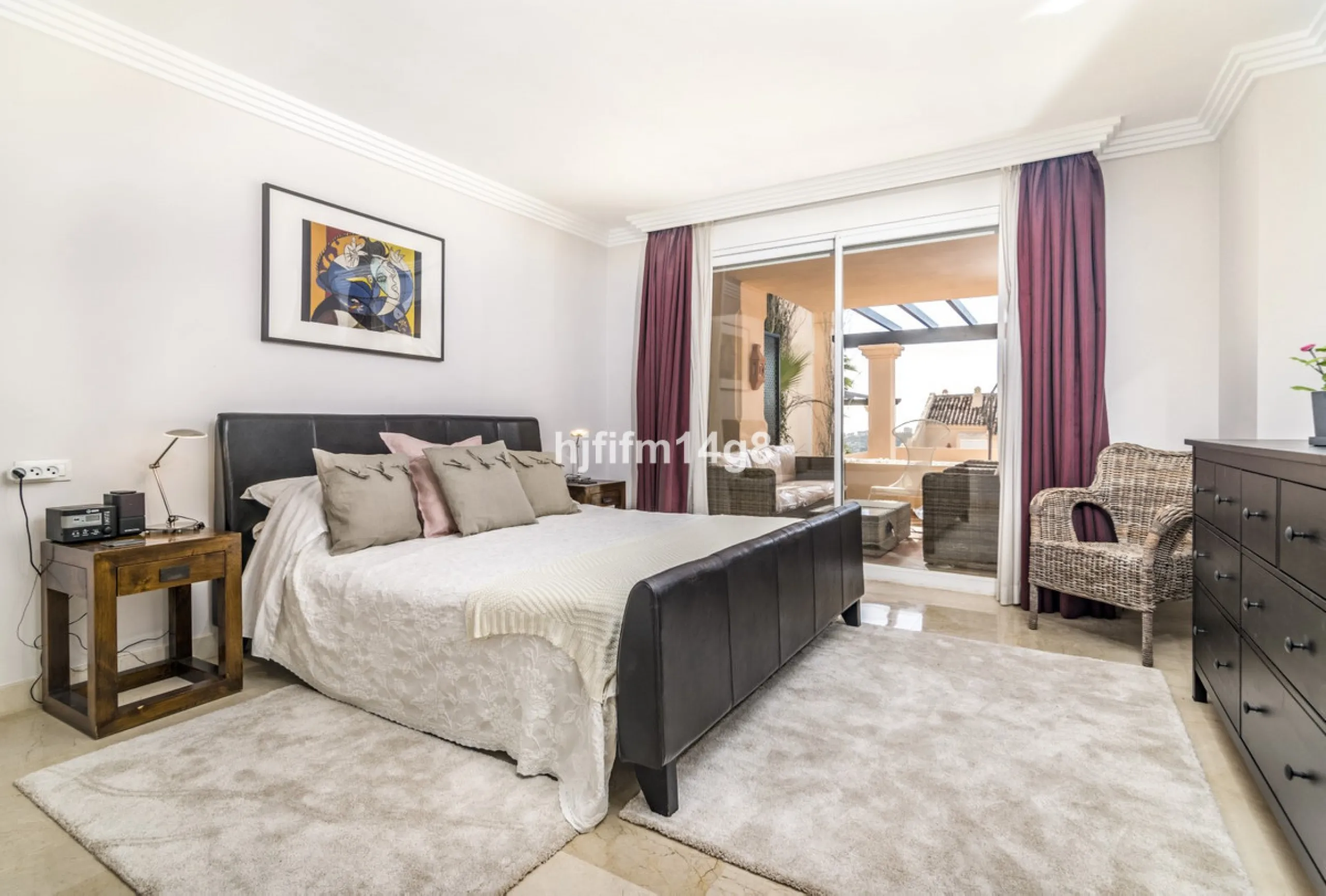 Discover this elegant two-bedroom elevated ground floor apartment for sale in the sought-after Albatross Hill complex, nestled in the scenic hills of Nueva Andalucía. This exclusive gated community offers a peaceful, secure lifestyle with outstanding amen