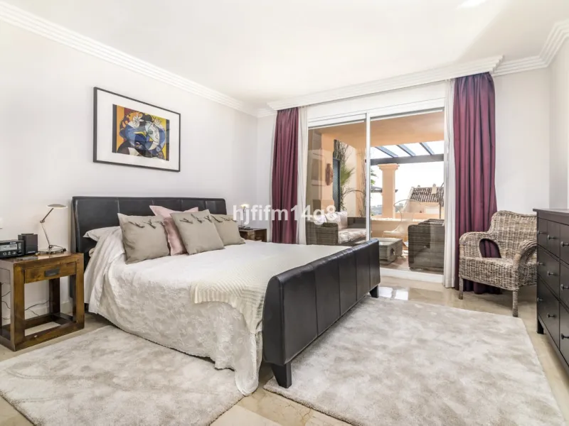 Discover this elegant two-bedroom elevated ground floor apartment for sale in the sought-after Albatross Hill complex, nestled in the scenic hills of Nueva Andalucía. This exclusive gated community offers a peaceful, secure lifestyle with outstanding amen