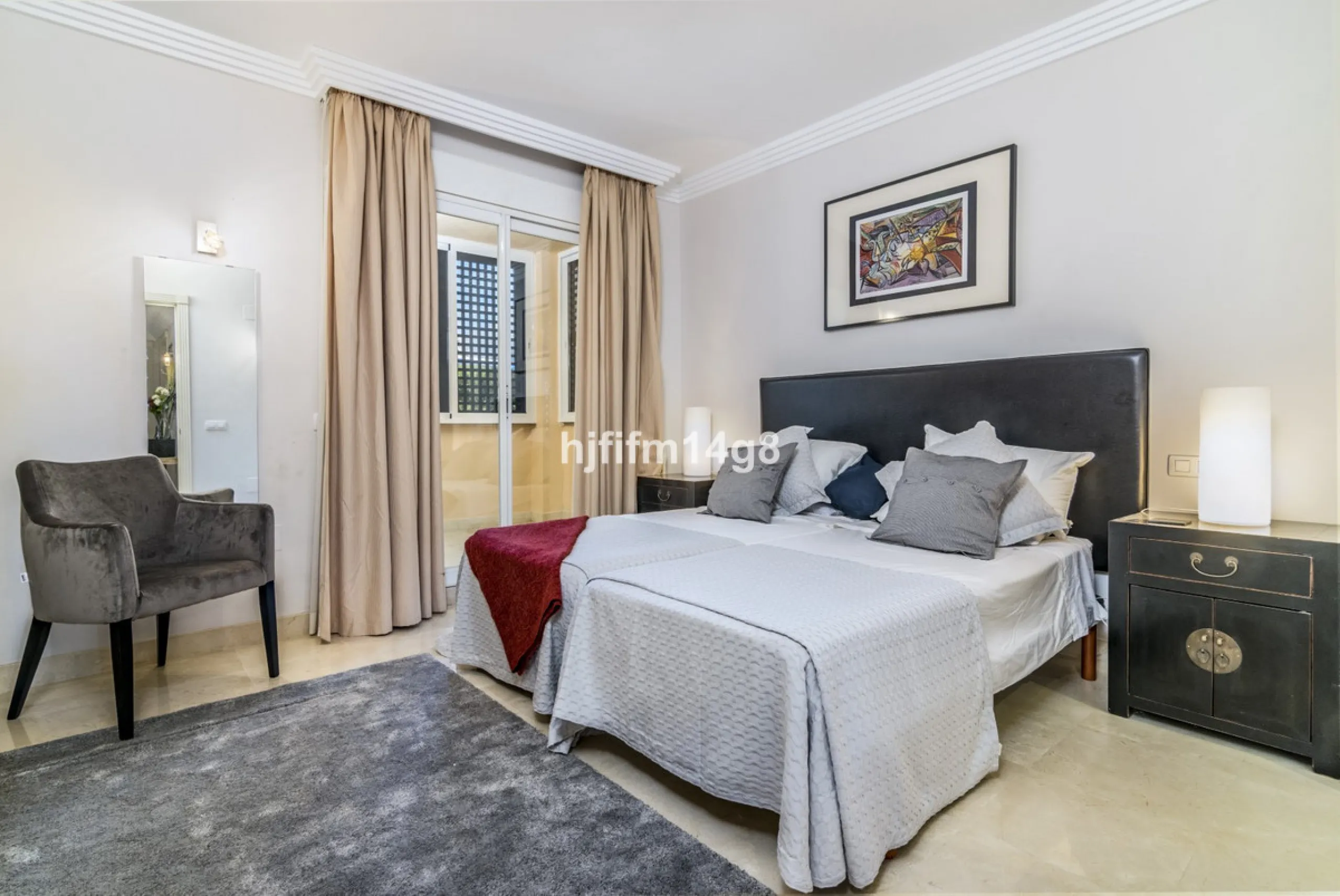 Discover this elegant two-bedroom elevated ground floor apartment for sale in the sought-after Albatross Hill complex, nestled in the scenic hills of Nueva Andalucía. This exclusive gated community offers a peaceful, secure lifestyle with outstanding amen