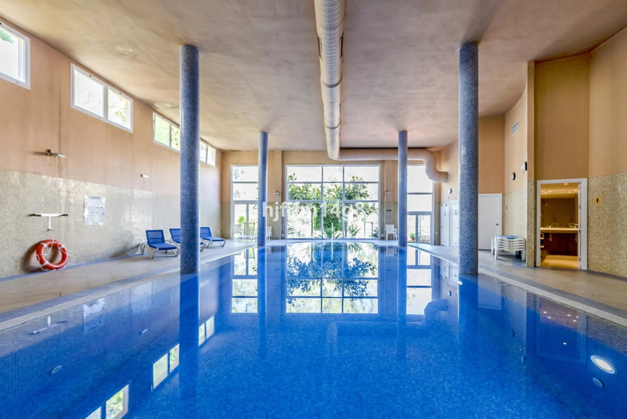 Discover this elegant two-bedroom elevated ground floor apartment for sale in the sought-after Albatross Hill complex, nestled in the scenic hills of Nueva Andalucía. This exclusive gated community offers a peaceful, secure lifestyle with outstanding amen