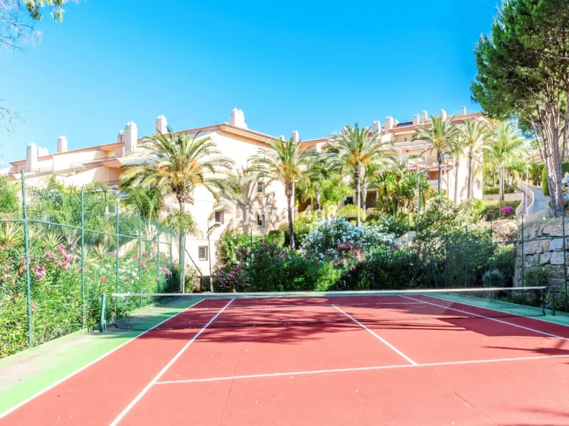 Discover this elegant two-bedroom elevated ground floor apartment for sale in the sought-after Albatross Hill complex, nestled in the scenic hills of Nueva Andalucía. This exclusive gated community offers a peaceful, secure lifestyle with outstanding amen