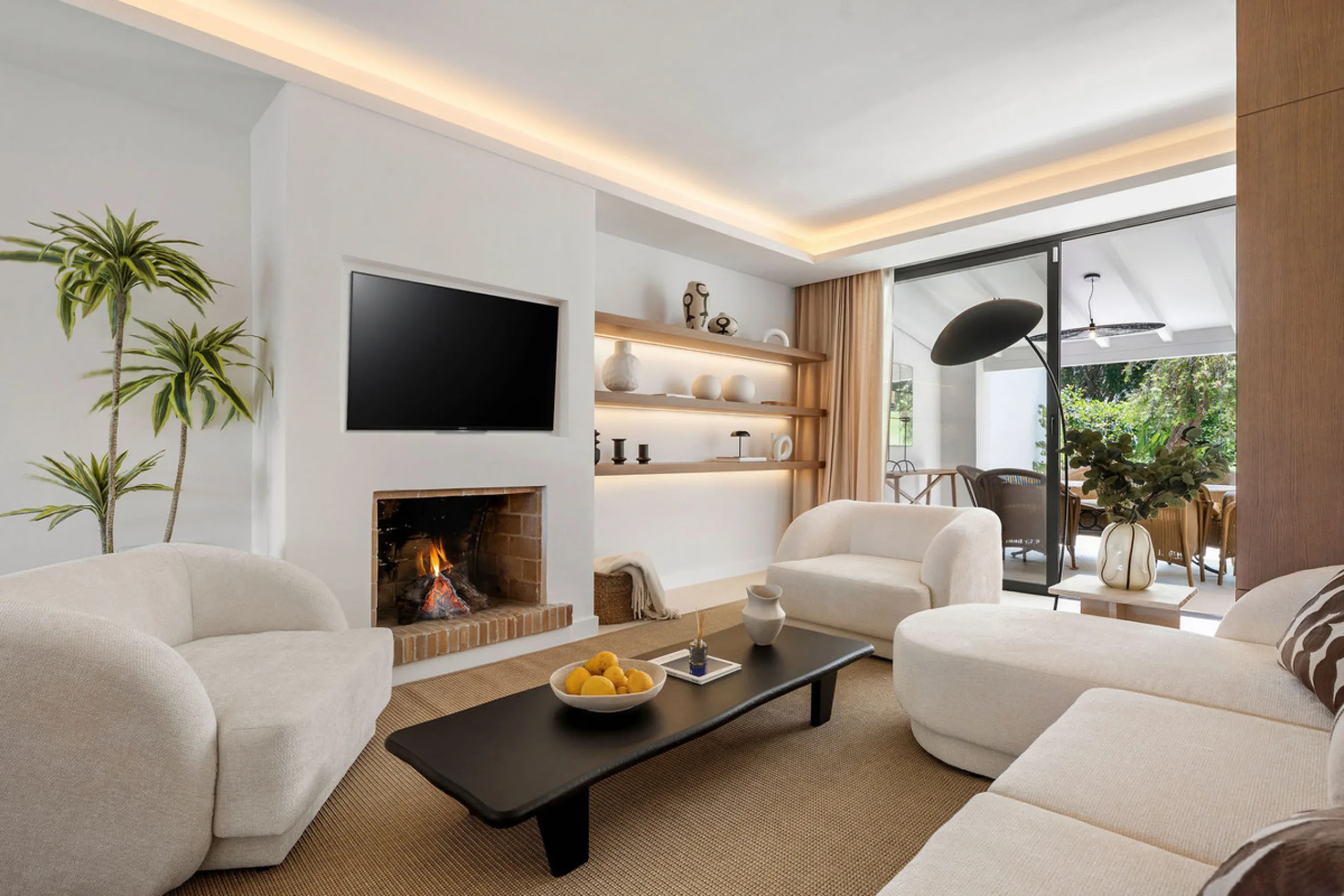 Beautifully designed three-story townhouse for sale in Nueva Andalucía's Golf Valley. Recently renovated, the property blends Mediterranean charm with the clean lines and functionality of modern living. Its architecture captures the lifestyle expectations