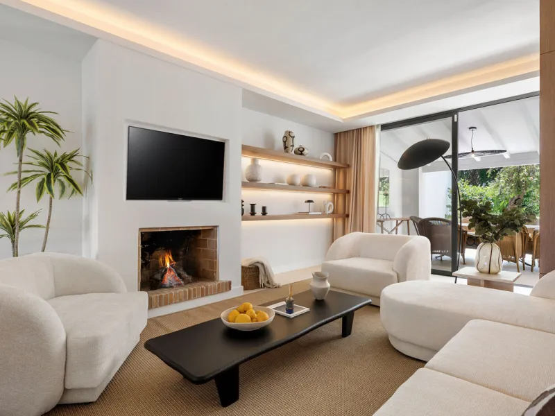 Beautifully designed three-story townhouse for sale in Nueva Andalucía's Golf Valley. Recently renovated, the property blends Mediterranean charm with the clean lines and functionality of modern living. Its architecture captures the lifestyle expectations