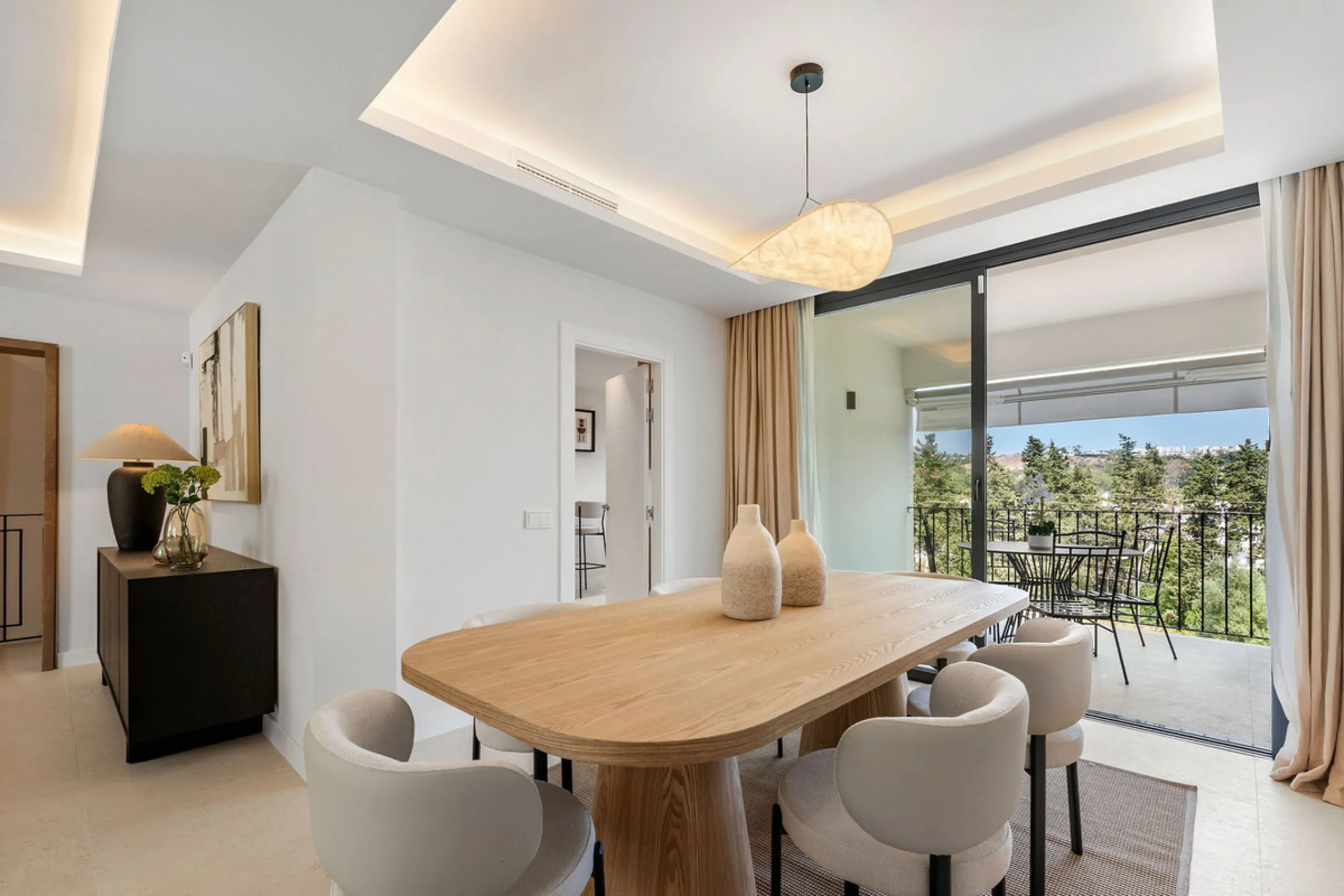 Beautifully designed three-story townhouse for sale in Nueva Andalucía's Golf Valley. Recently renovated, the property blends Mediterranean charm with the clean lines and functionality of modern living. Its architecture captures the lifestyle expectations