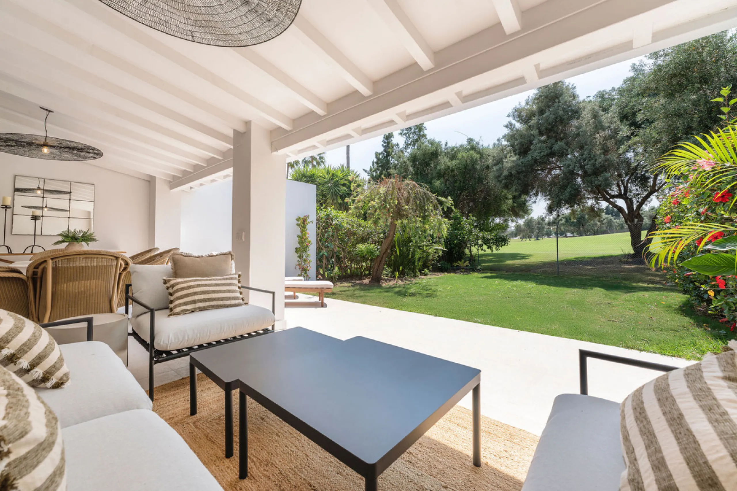 Beautifully designed three-story townhouse for sale in Nueva Andalucía's Golf Valley. Recently renovated, the property blends Mediterranean charm with the clean lines and functionality of modern living. Its architecture captures the lifestyle expectations