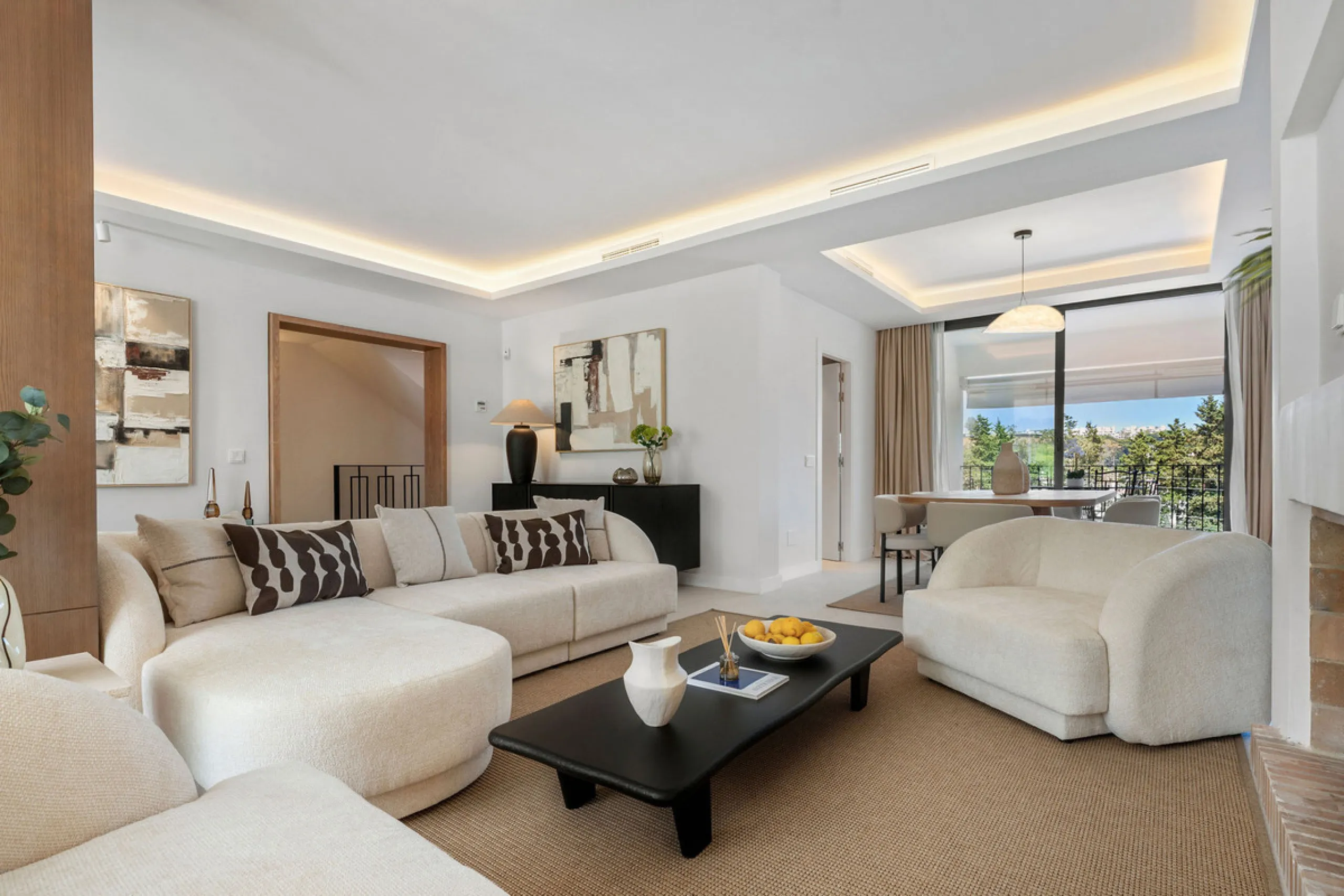 Beautifully designed three-story townhouse for sale in Nueva Andalucía's Golf Valley. Recently renovated, the property blends Mediterranean charm with the clean lines and functionality of modern living. Its architecture captures the lifestyle expectations