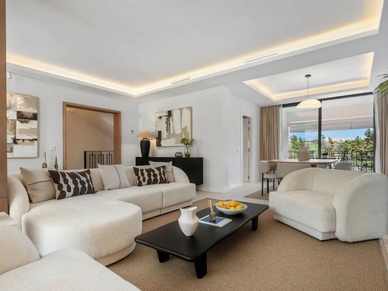 Beautifully designed three-story townhouse for sale in Nueva Andalucía's Golf Valley. Recently renovated, the property blends Mediterranean charm with the clean lines and functionality of modern living. Its architecture captures the lifestyle expectations
