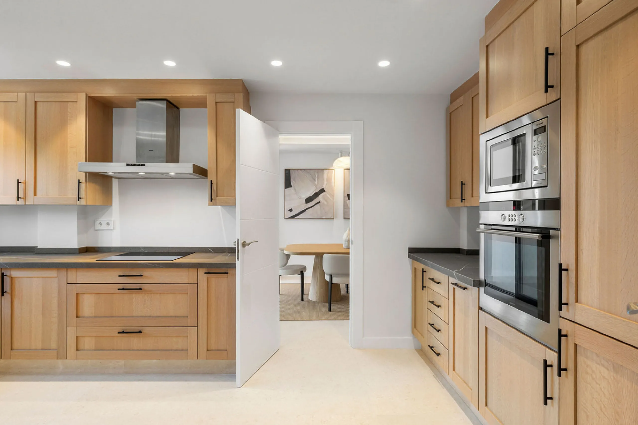 Beautifully designed three-story townhouse for sale in Nueva Andalucía's Golf Valley. Recently renovated, the property blends Mediterranean charm with the clean lines and functionality of modern living. Its architecture captures the lifestyle expectations