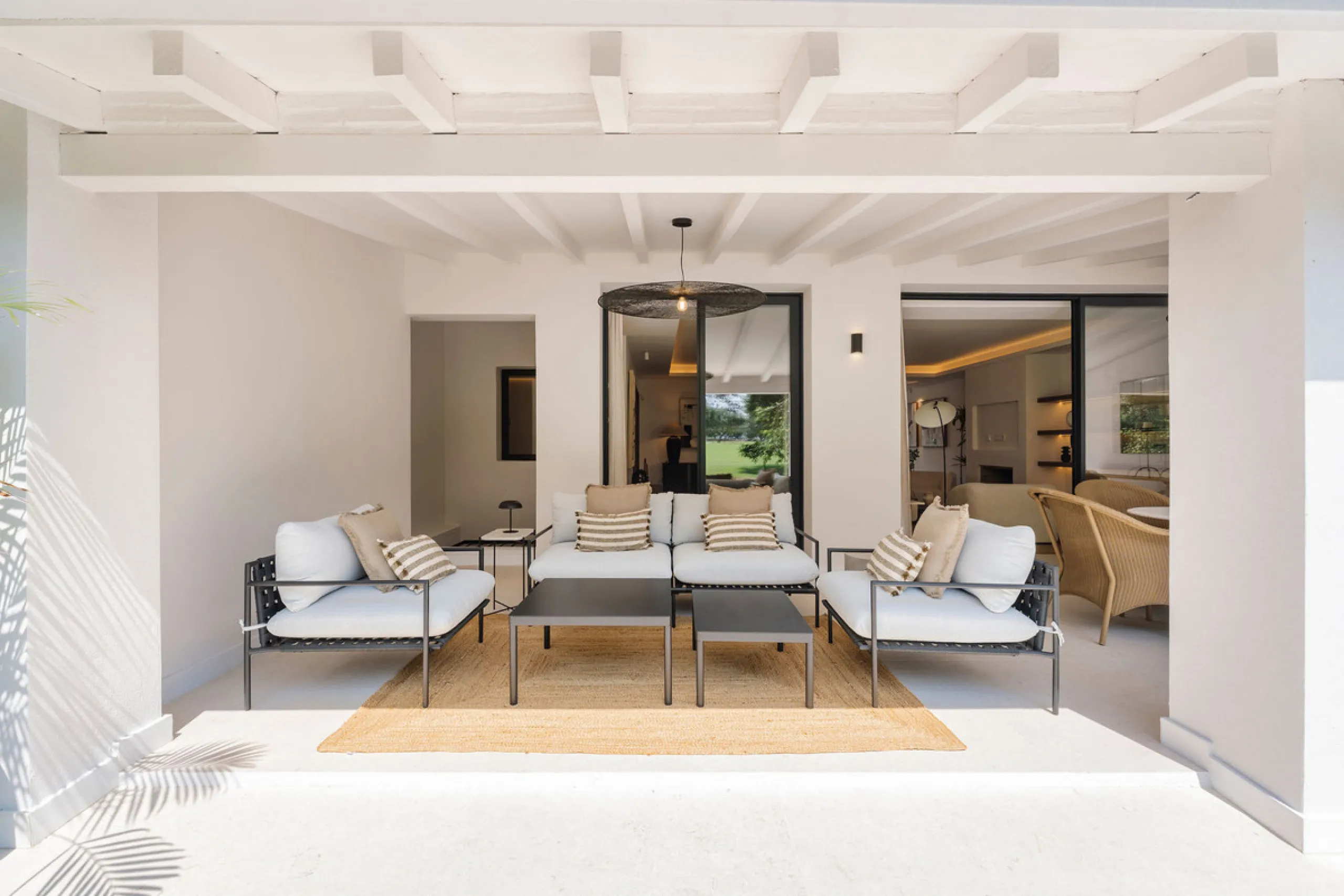 Beautifully designed three-story townhouse for sale in Nueva Andalucía's Golf Valley. Recently renovated, the property blends Mediterranean charm with the clean lines and functionality of modern living. Its architecture captures the lifestyle expectations
