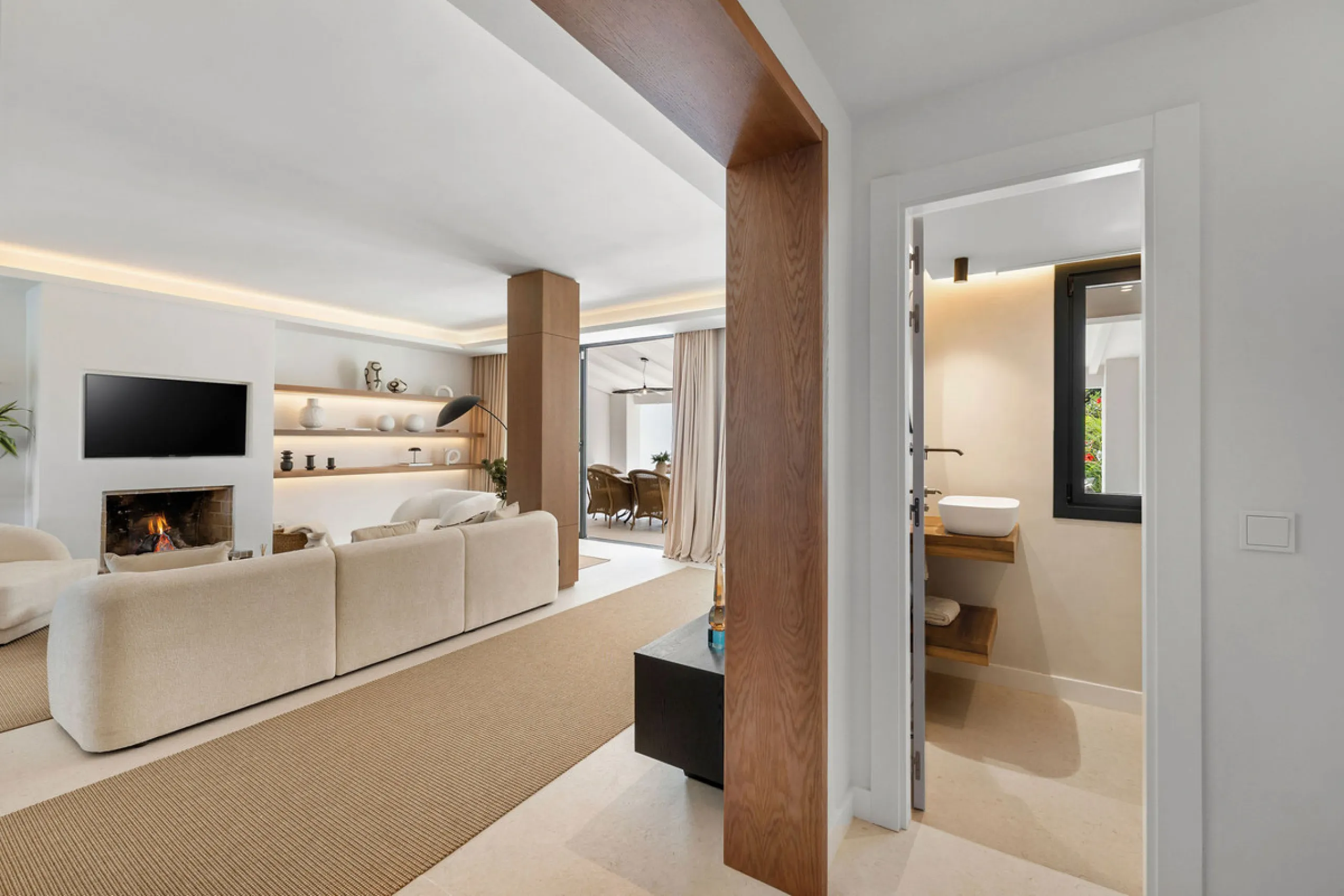 Beautifully designed three-story townhouse for sale in Nueva Andalucía's Golf Valley. Recently renovated, the property blends Mediterranean charm with the clean lines and functionality of modern living. Its architecture captures the lifestyle expectations