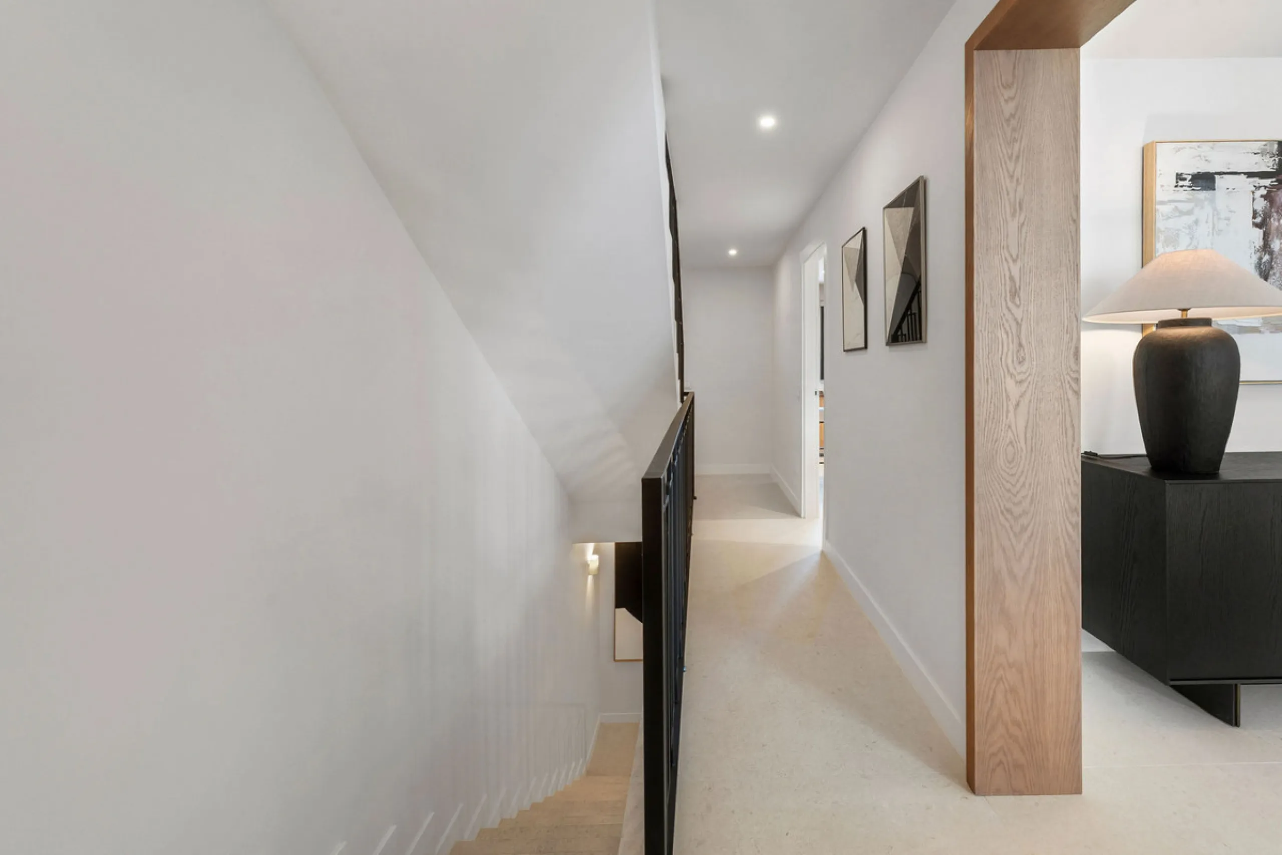 Beautifully designed three-story townhouse for sale in Nueva Andalucía's Golf Valley. Recently renovated, the property blends Mediterranean charm with the clean lines and functionality of modern living. Its architecture captures the lifestyle expectations