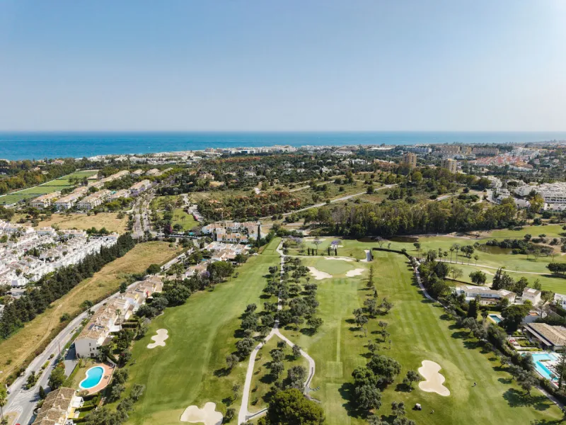 Beautifully designed three-story townhouse for sale in Nueva Andalucía's Golf Valley. Recently renovated, the property blends Mediterranean charm with the clean lines and functionality of modern living. Its architecture captures the lifestyle expectations
