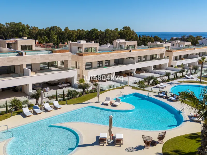 Discover your dream home in the prestigious Epic Phase 3, located in the heart of the Marbella Golden Mile. This spacious ground floor apartment features four elegantly designed bedrooms, offering ample space for families or those seeking a luxurious life