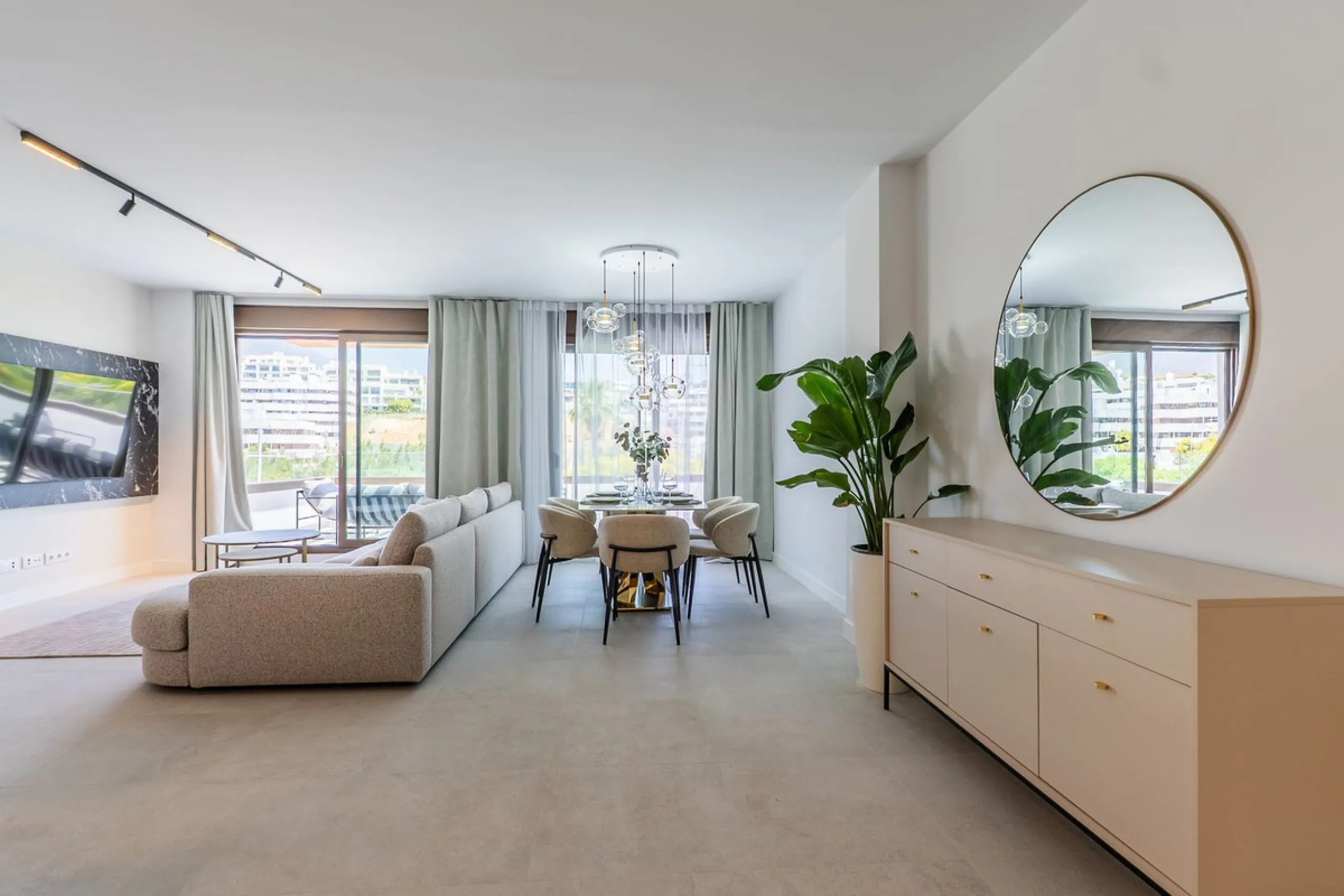 This beautifully appointed 123m² residence with a 20m² terrace offers the perfect blend of modern comfort and prime location. Just a 10-minute stroll from Estepona Port's vibrant marina, the home features an inviting open-plan layout with designer kitchen