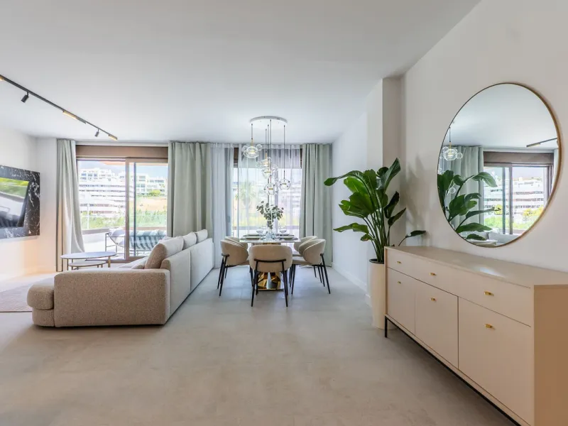 This beautifully appointed 123m² residence with a 20m² terrace offers the perfect blend of modern comfort and prime location. Just a 10-minute stroll from Estepona Port's vibrant marina, the home features an inviting open-plan layout with designer kitchen