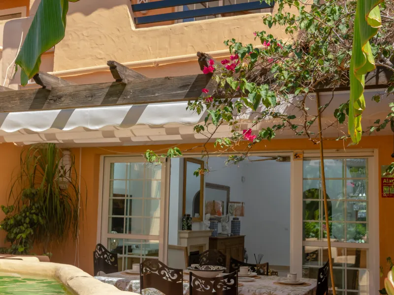 Situated in the prestigious Oasis de Nagüeles urbanization on Marbella's sought-after Golden Mile, this spacious 5-level townhouse offers a unique opportunity to create your ideal home in one of the best areas of the Costa del Sol.