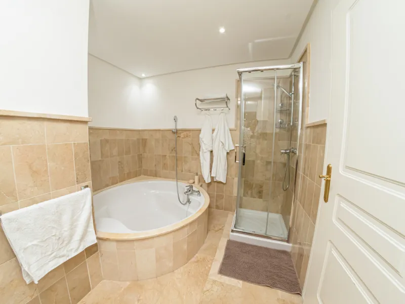 Situated in the prestigious Oasis de Nagüeles urbanization on Marbella's sought-after Golden Mile, this spacious 5-level townhouse offers a unique opportunity to create your ideal home in one of the best areas of the Costa del Sol.